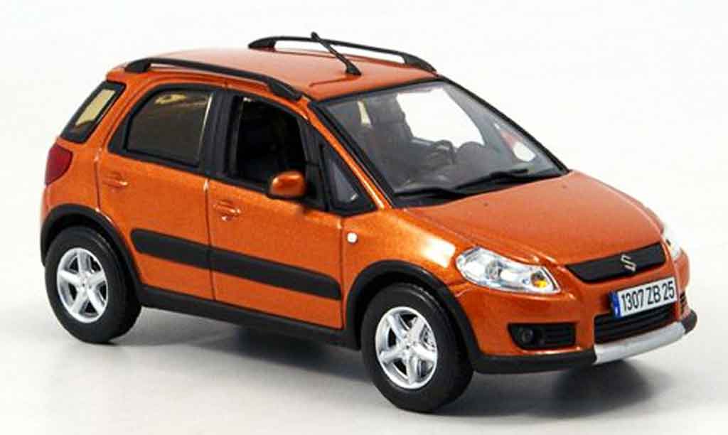 Suzuki SX4 1/43 Norev orange 2006 modellino in miniatura