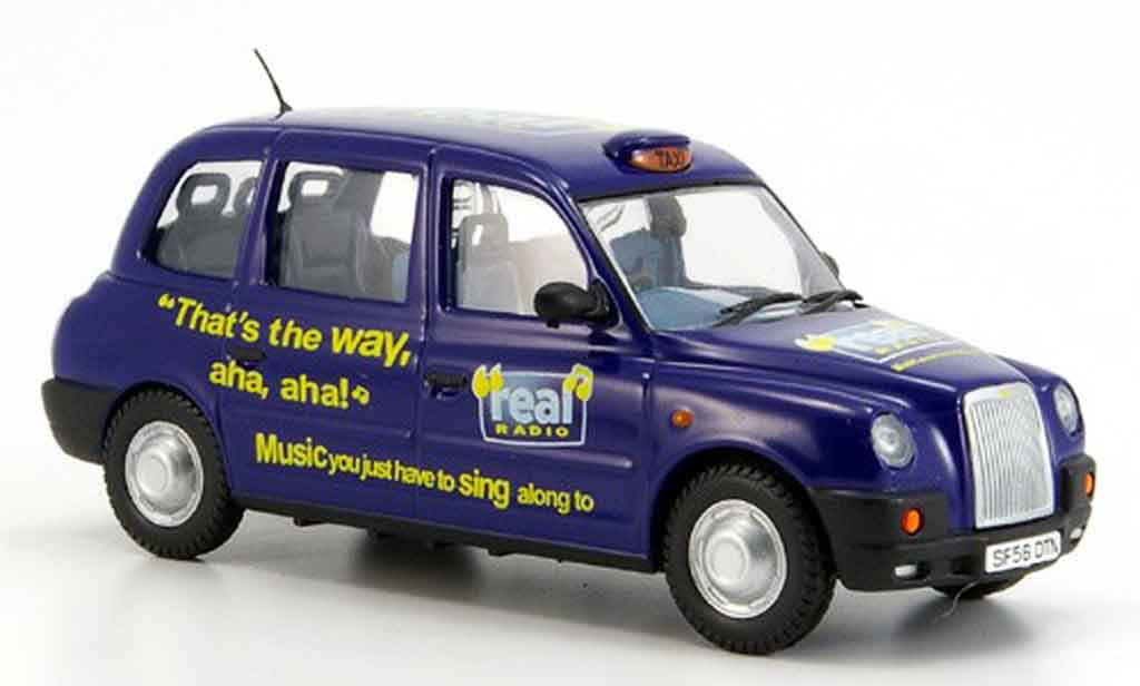 Austin TX4 1/43 Oxford Taxi blu Real Radio modellino in miniatura
