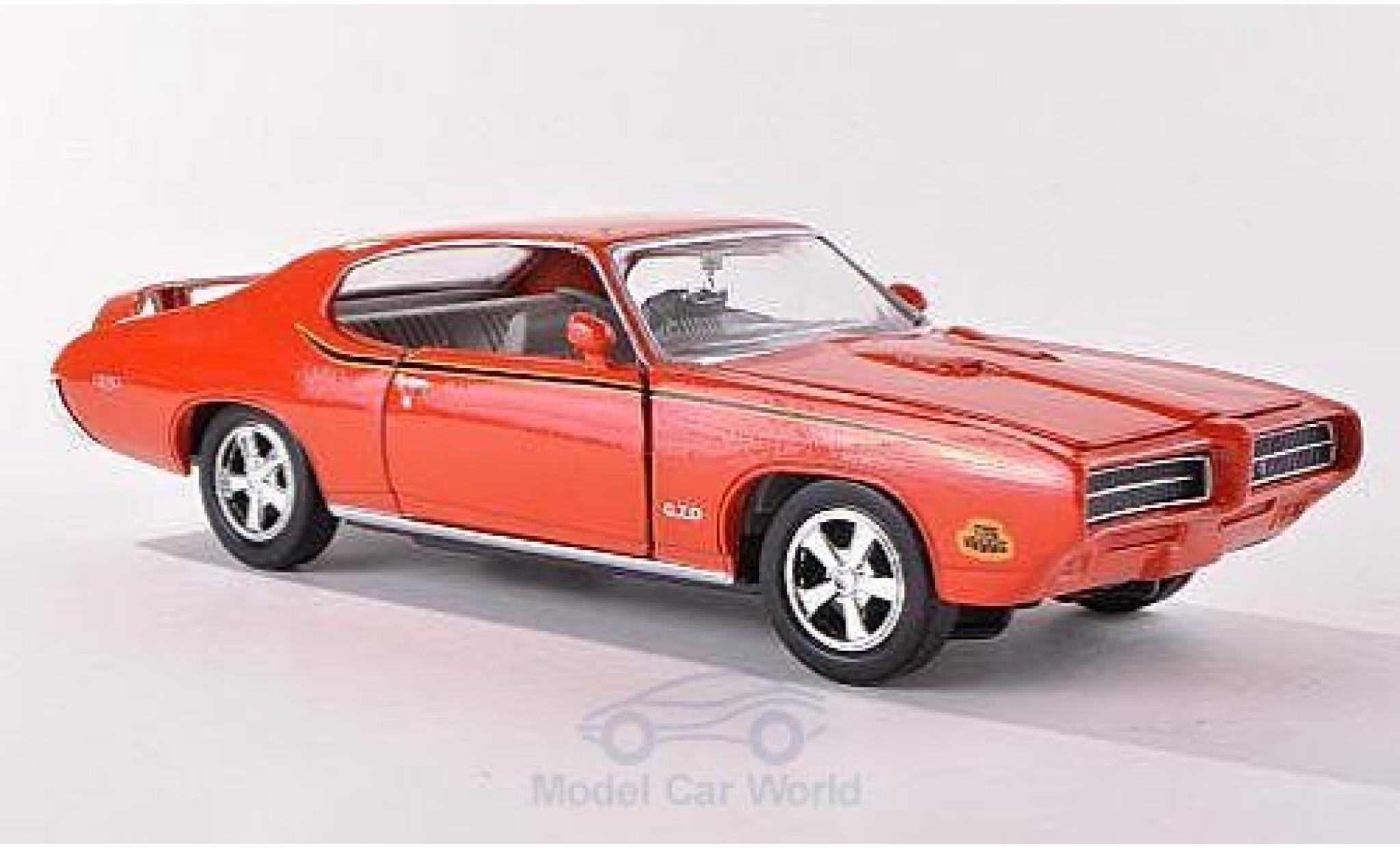 Pontiac GTO 1/24 Motormax Judge orange 1969 modellino in miniatura