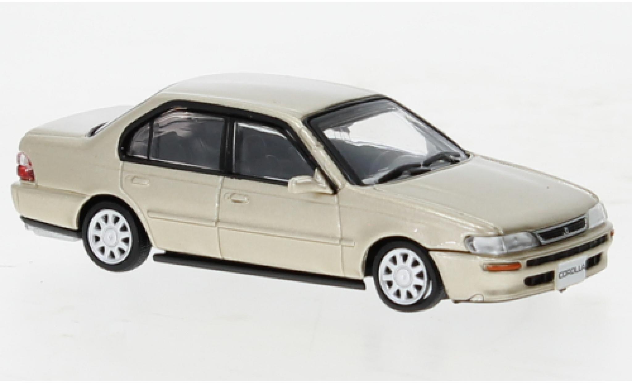 Toyota Corolla 1/64 BM Creations (AE100) metallise beige 1996 modellino in miniatura
