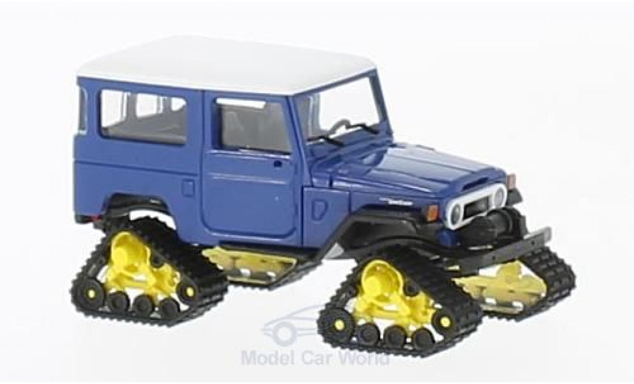 Toyota Land Cruiser 1/87 Busch J4 blu/bianco 1960 mit Raupenantrieb modellino in miniatura