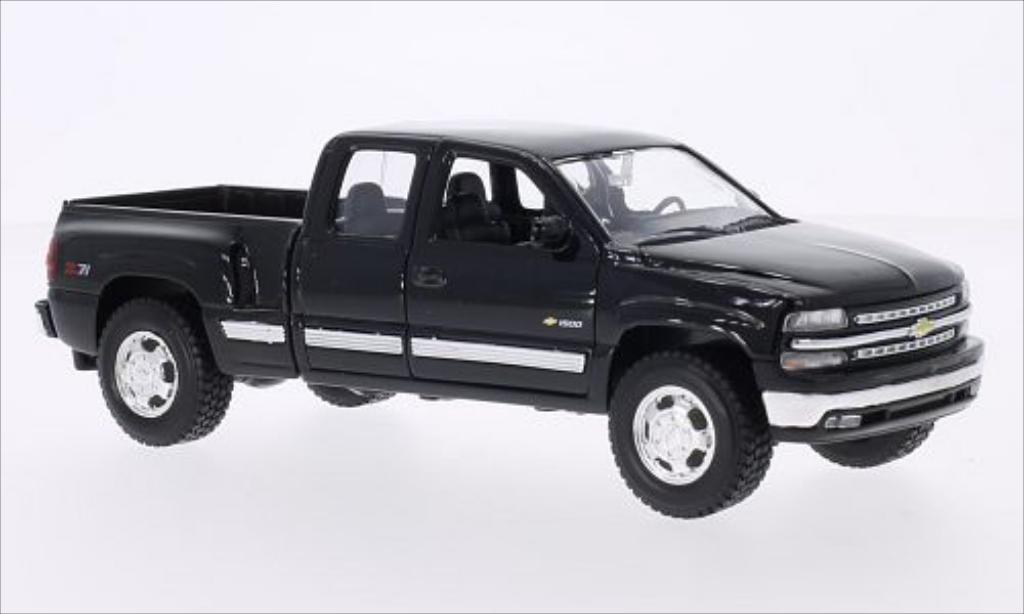 Chevrolet Silverado 1/24 Welly nero 1999 modellino in miniatura