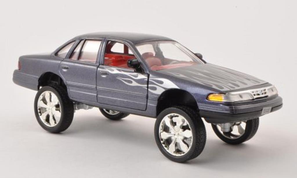 Ford Crown 1/24 Motormax Victoria Tuning anthrazit mit Dekor 2001 modellino in miniatura