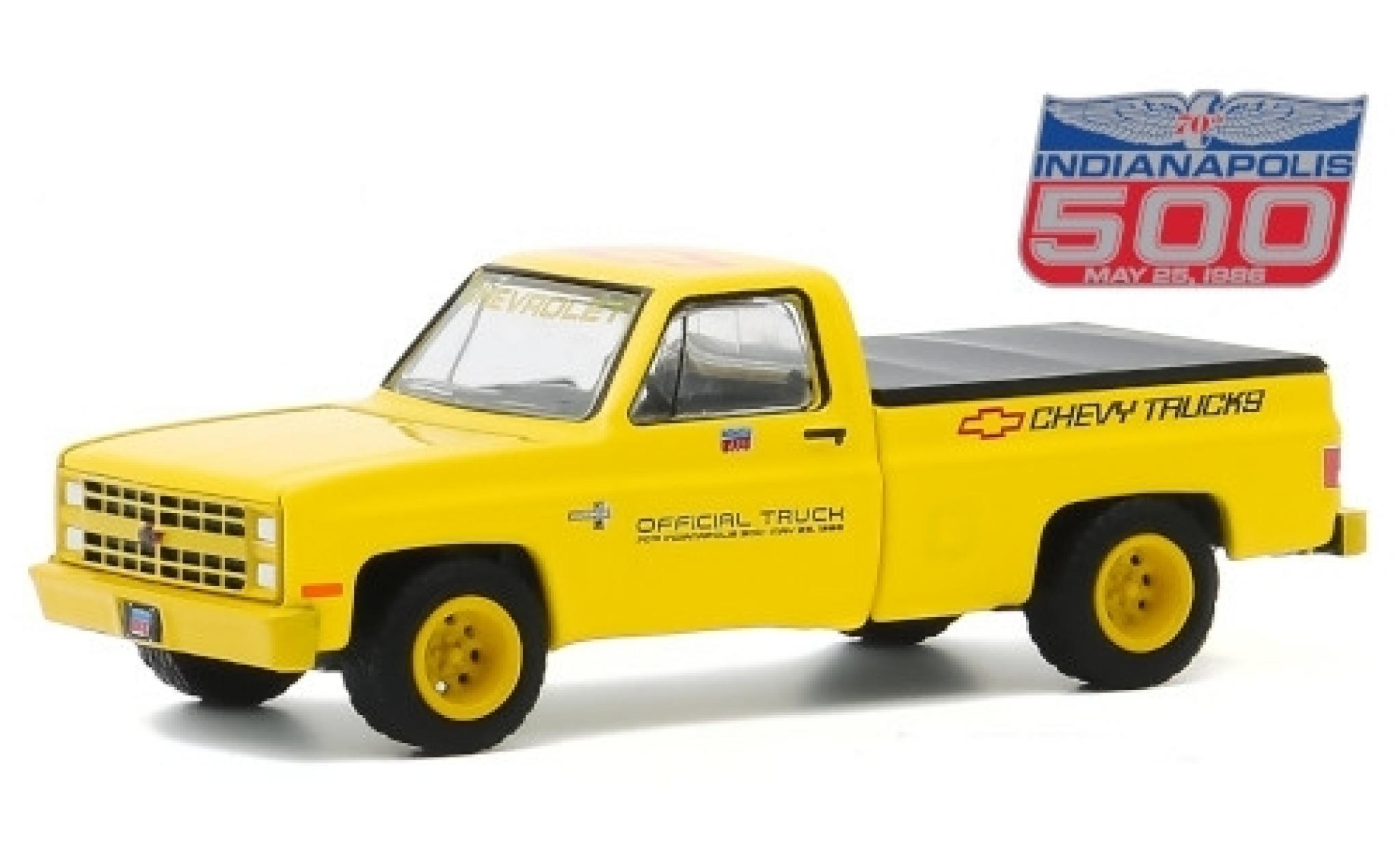 Chevrolet Silverado 1/64 Greenlight giallo/Dekor Official Truck 1986 70th Annual Indianapolis 500 Mile Race modellino in miniatura