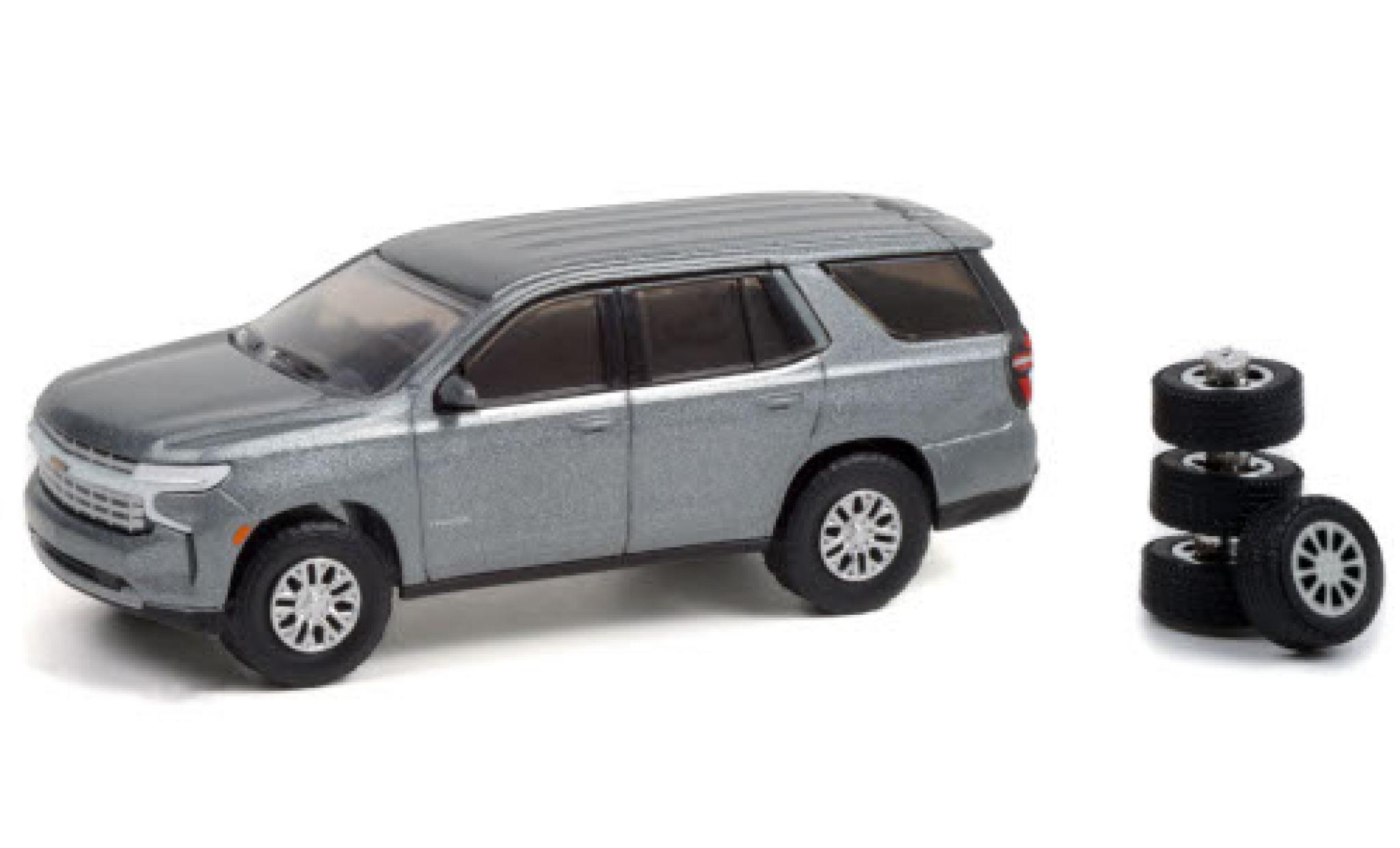 Chevrolet Tahoe 1/64 Greenlight metallico grigio 2021 avec Ersatzrädern modellino in miniatura