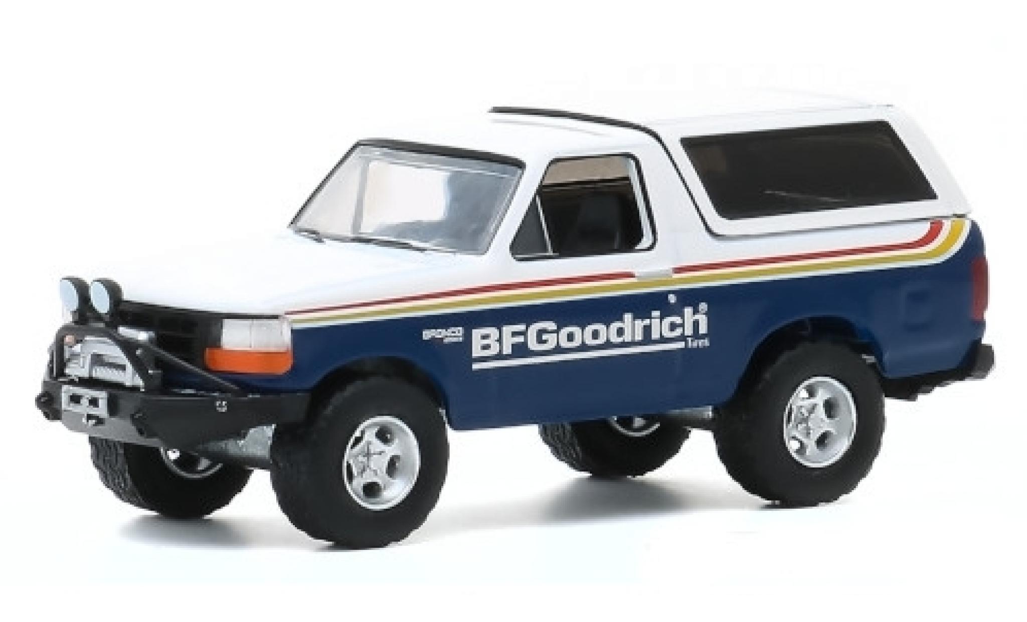 Ford Bronco 1/64 Greenlight blu/bianco BF Goodrich 1992 modellino in miniatura