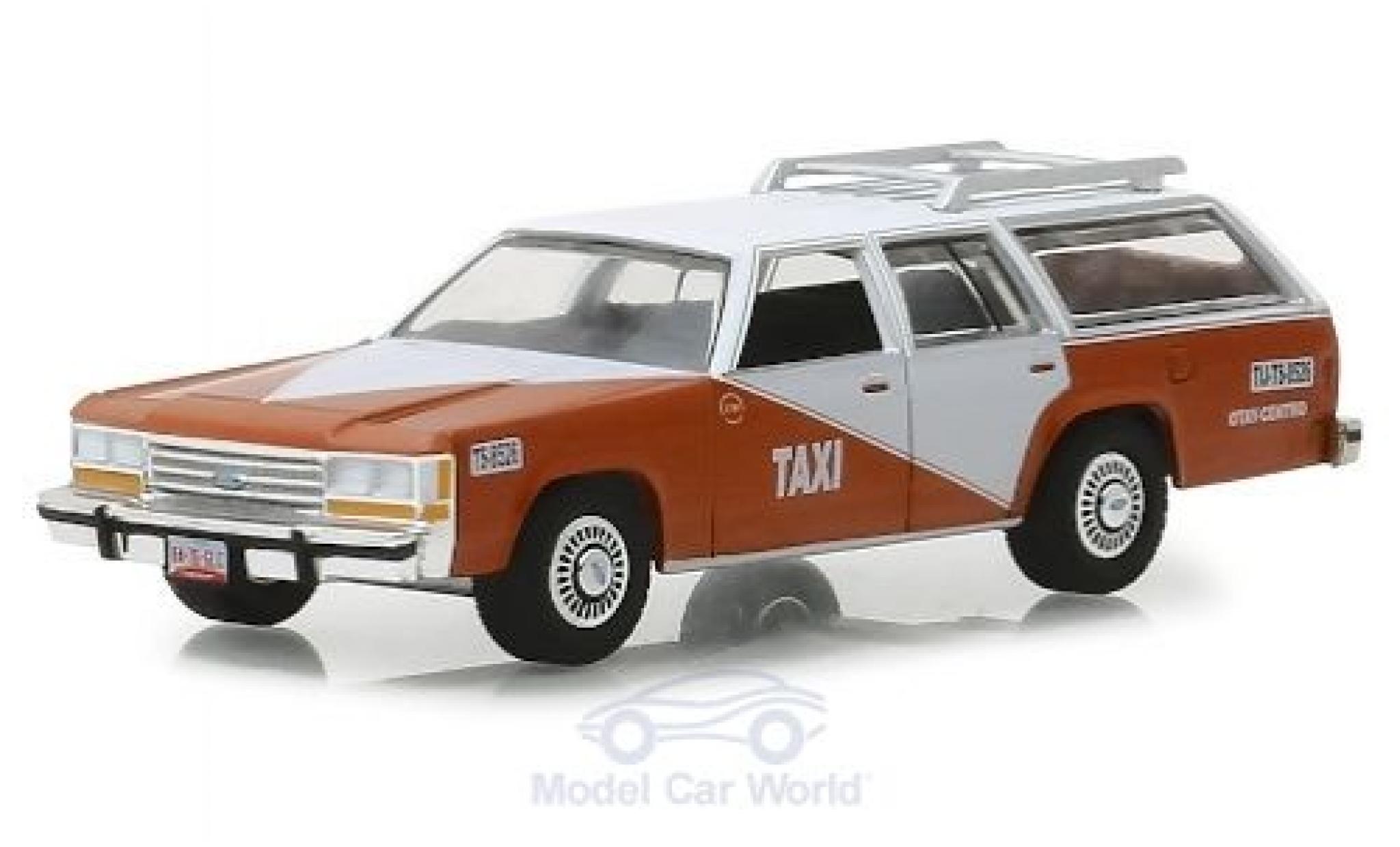 Ford LTD 1/64 Greenlight Crown Victoria Wagon Tijuana Centro Taxi 1988 modellino in miniatura