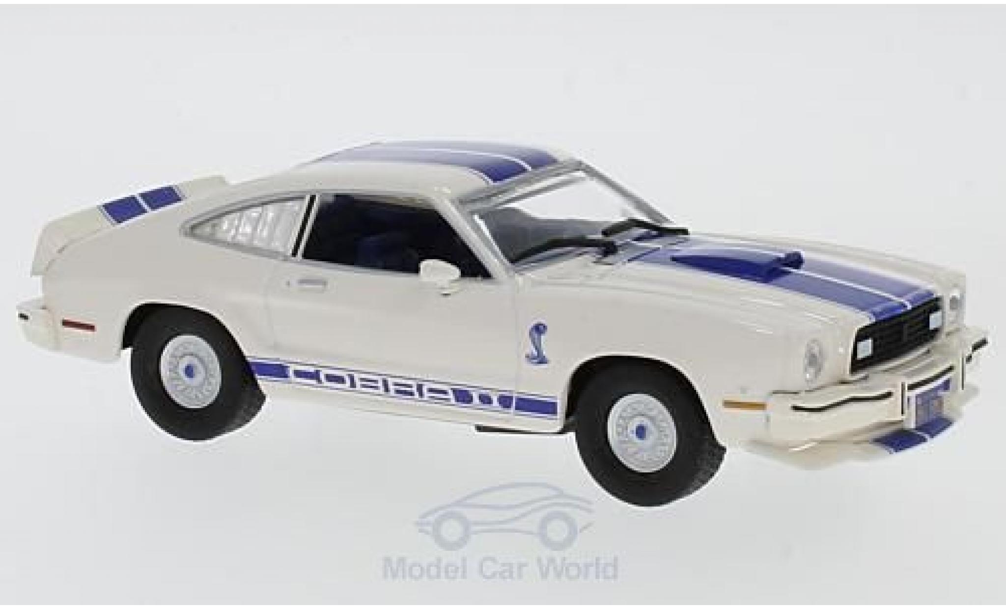 Ford Mustang 1/43 Greenlight II Cobra II beige/blu Charlies Angels 1976 modellino in miniatura
