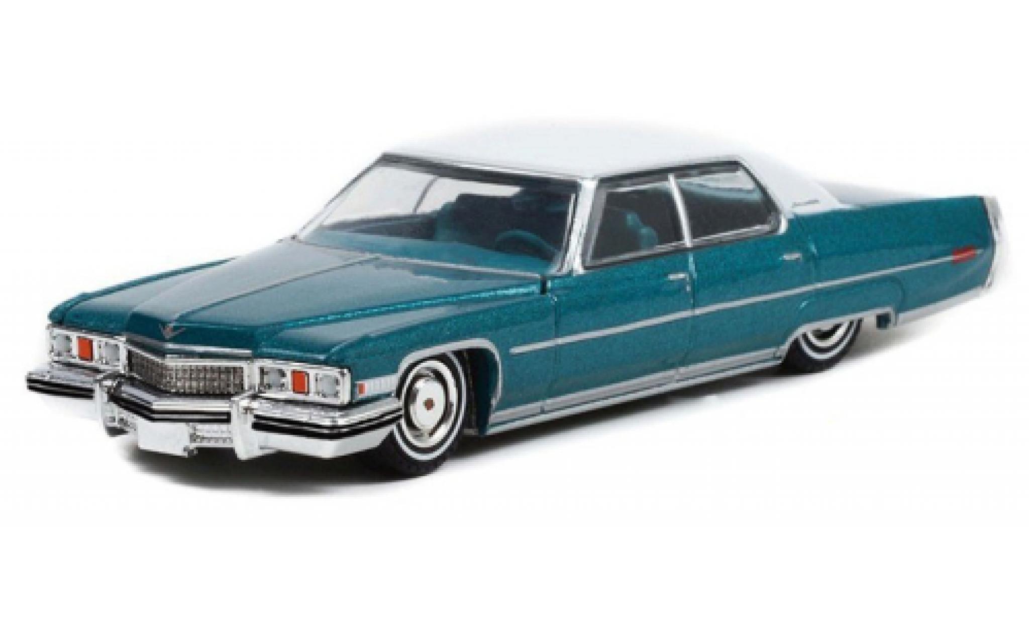 Cadillac Sedan 1/64 Greenlight DeVille Lowrider metallise turchese/bianco 1973 modellino in miniatura