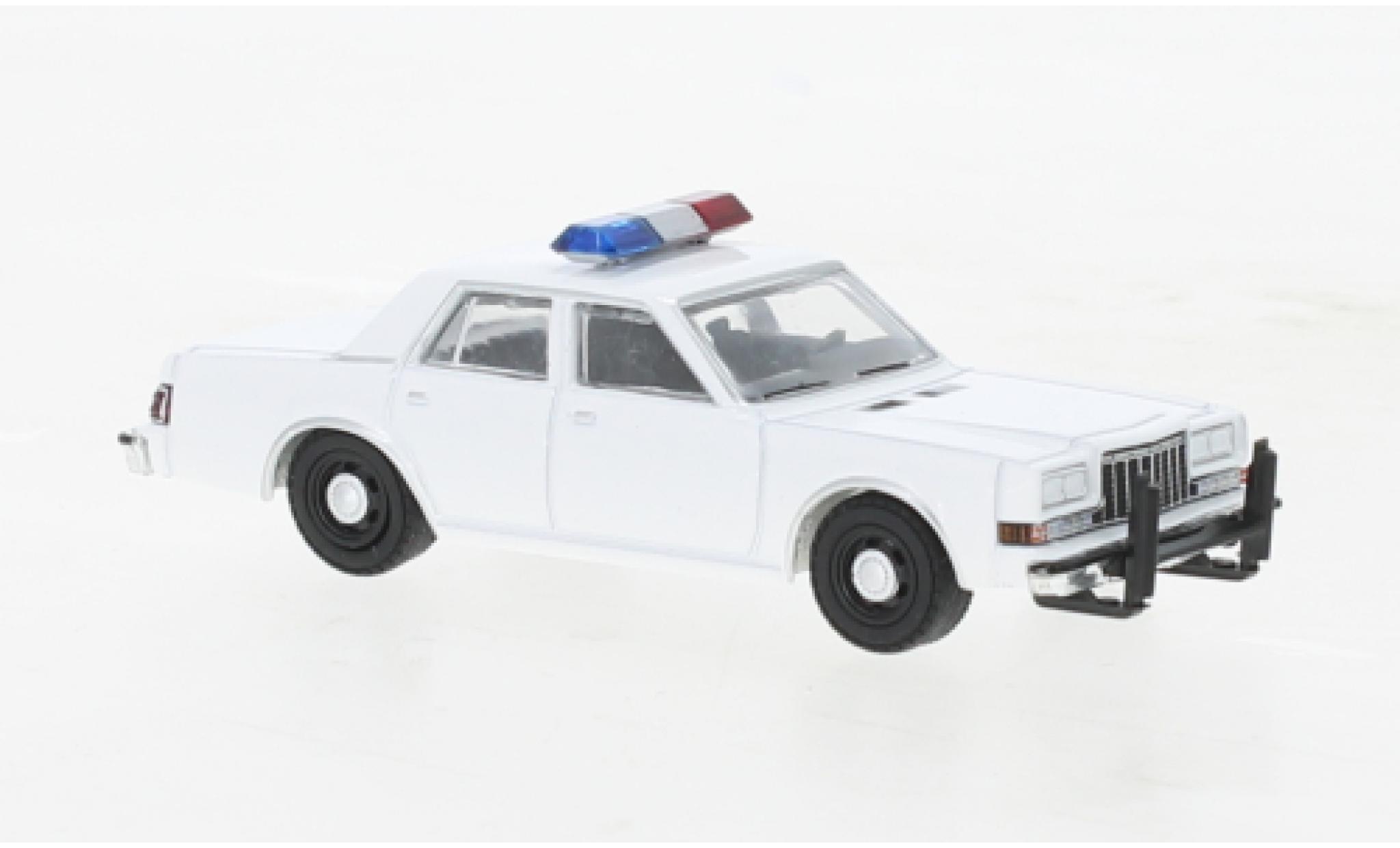 Dodge Diplomat 1/64 Greenlight bianco Police (USA) 1980 modellino in miniatura