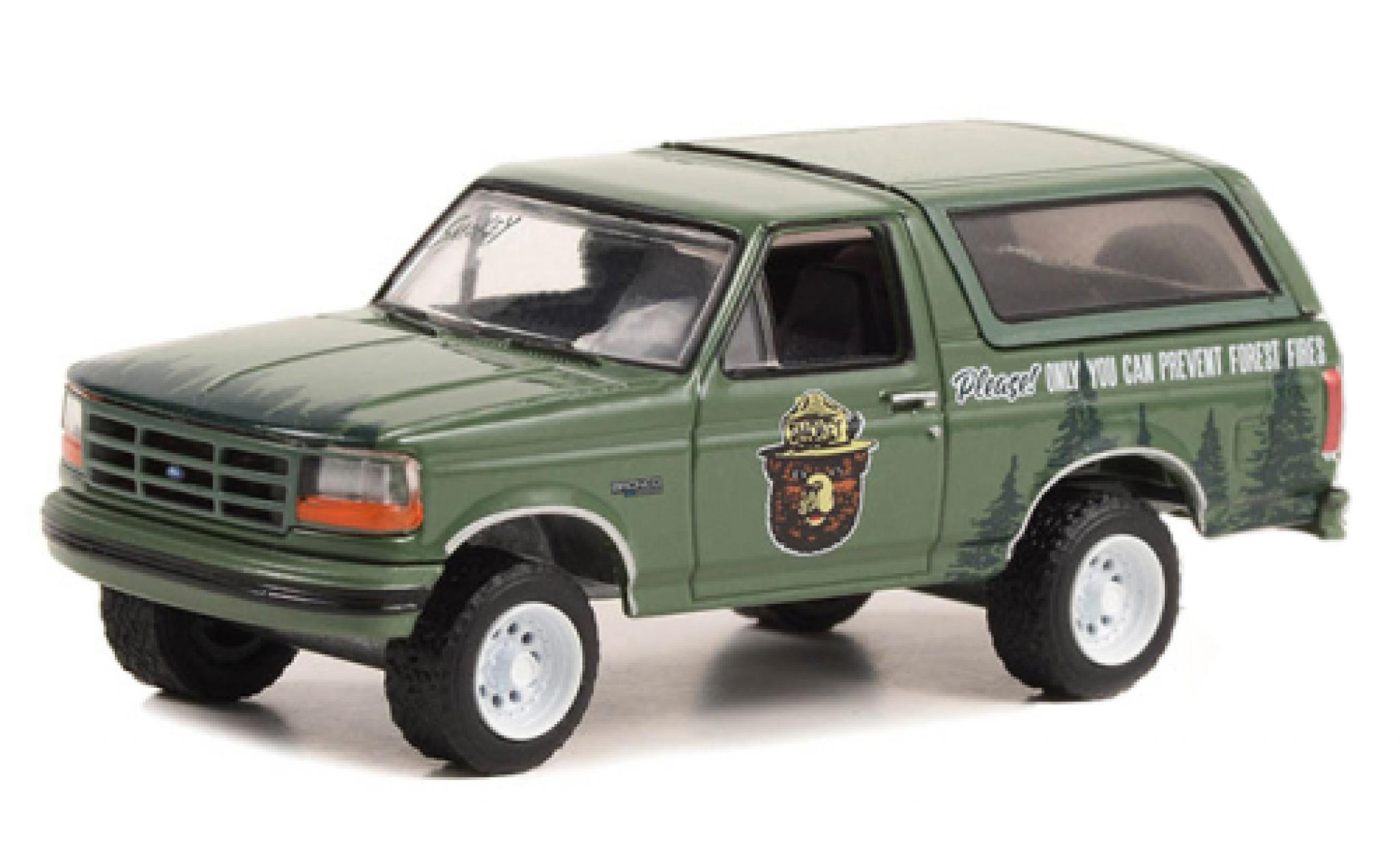 Ford Bronco 1/64 Greenlight verde Smokey Bear 1996 modellino in miniatura