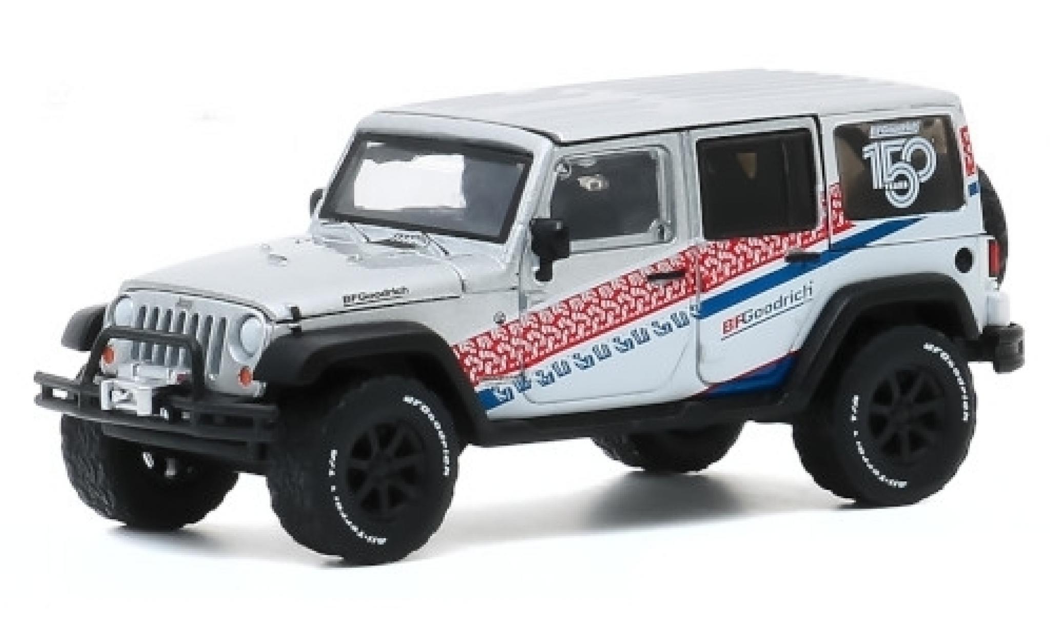 Jeep Wrangler 1/64 Greenlight Unlimited grigio/Dekor 2015 150 Years BFGoodrich modellino in miniatura