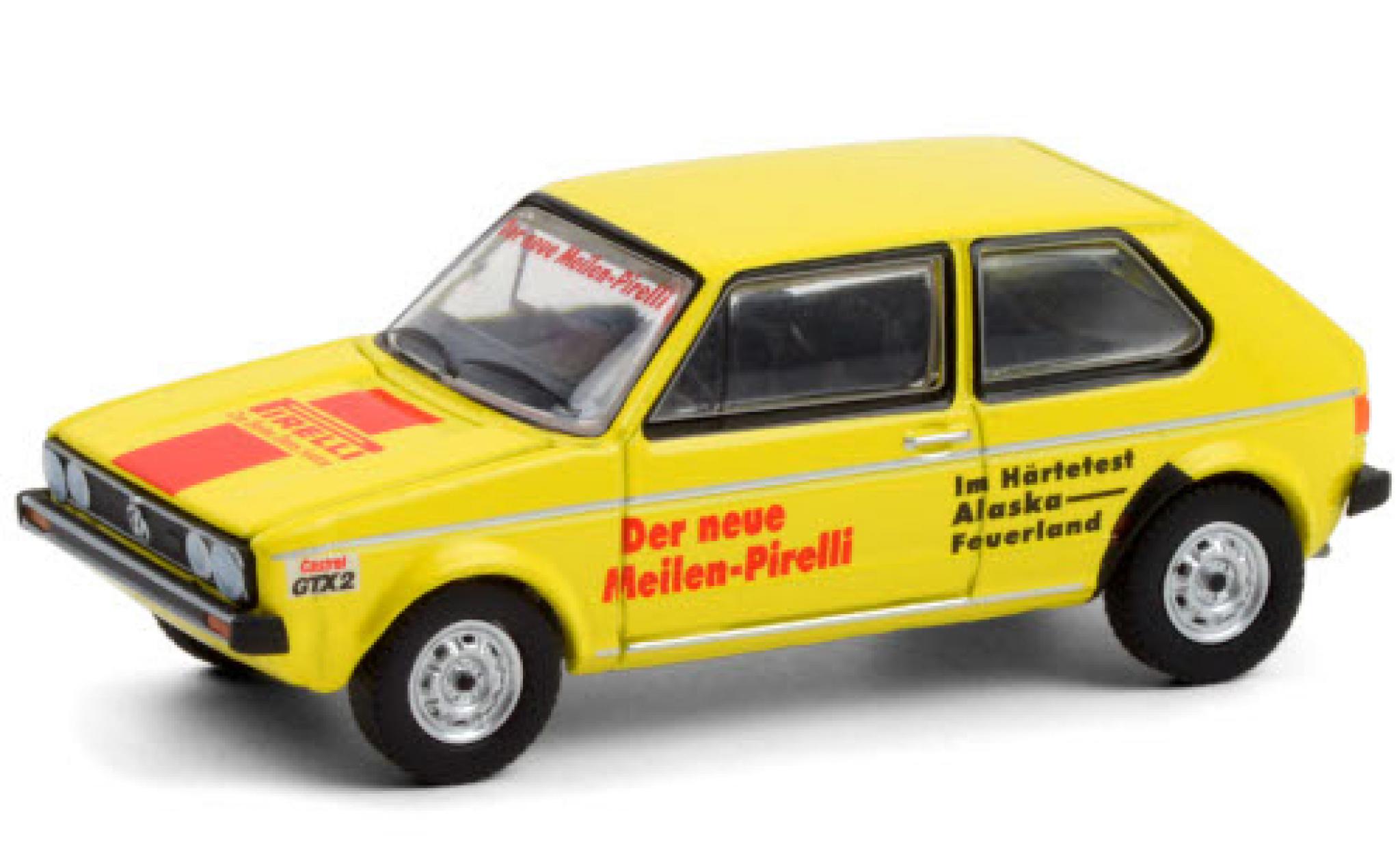 Volkswagen Golf 1/64 Greenlight I giallo/Dekor Pirelli 1974 Härtetest: Alaska - Feuerland modellino in miniatura