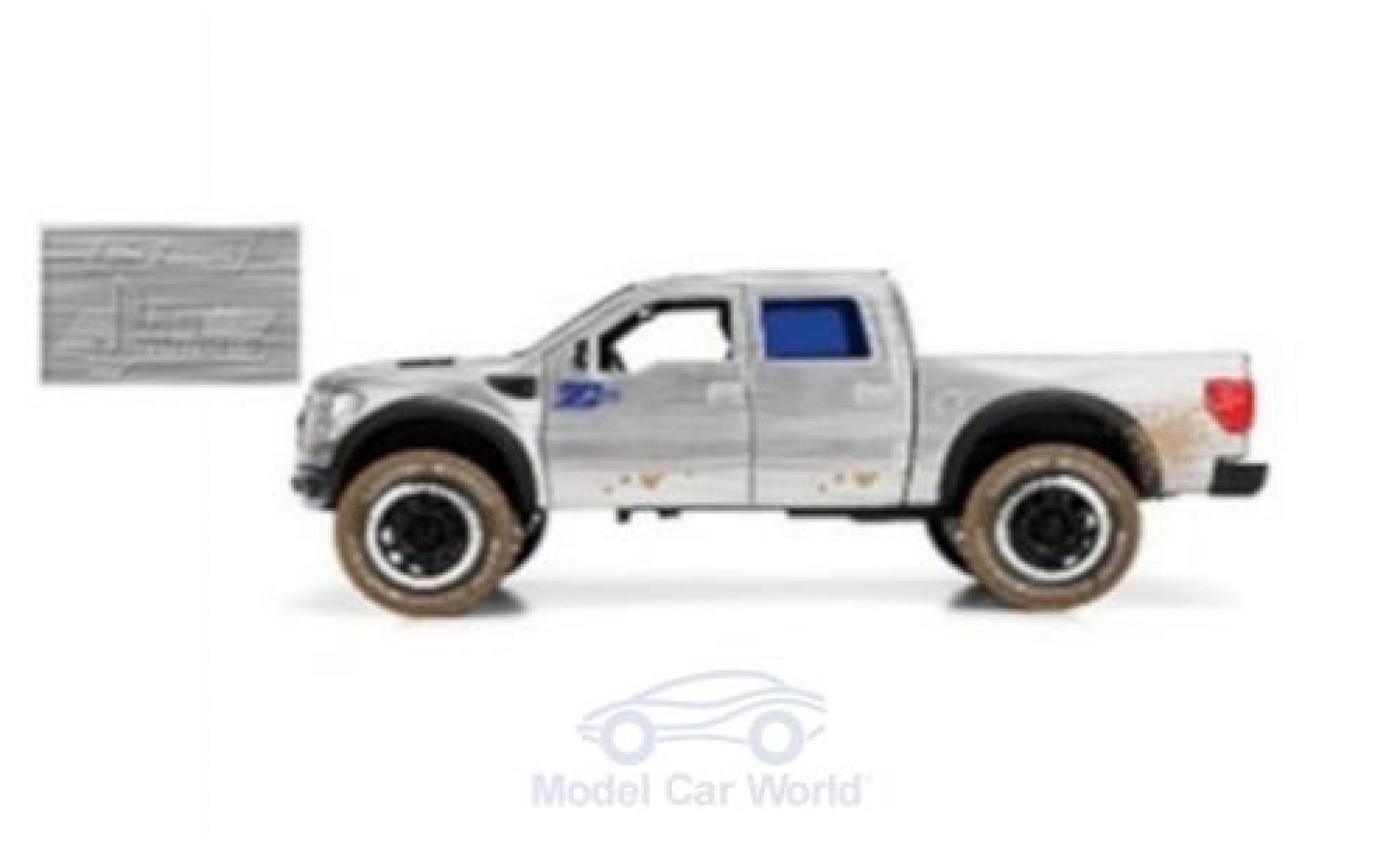 Ford F-1 1/24 Jada Toys 50 SVT Raptor grigio/blu 2011 mit Schmutzeffekt modellino in miniatura