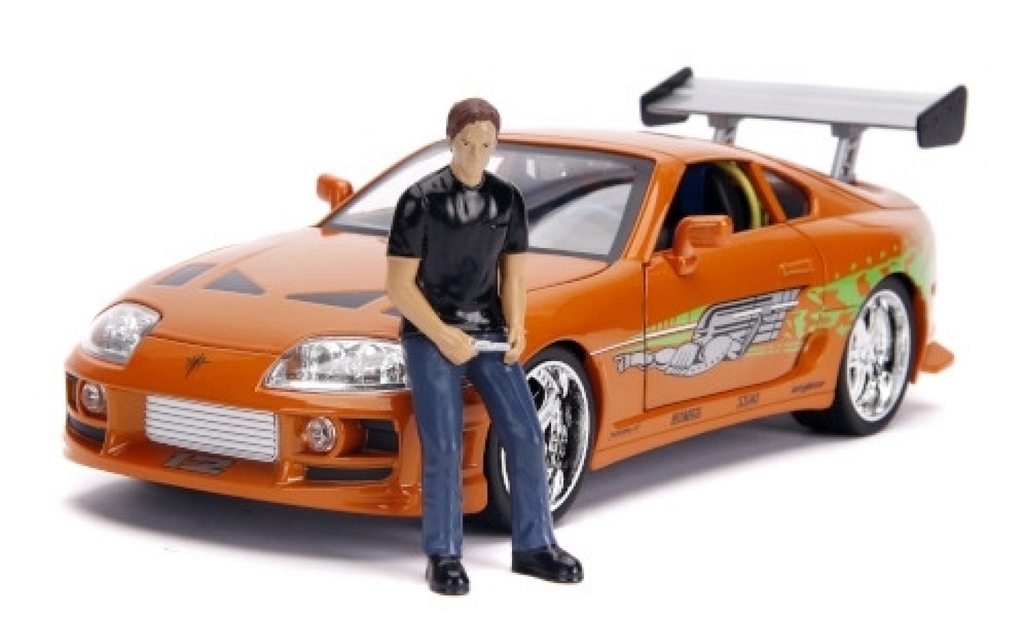 Toyota Supra 1/18 Jada Toys metallico orange/Dekor Fast & Furious 1995 avec figurine et Scheinwerferfunktion modellino in miniatura