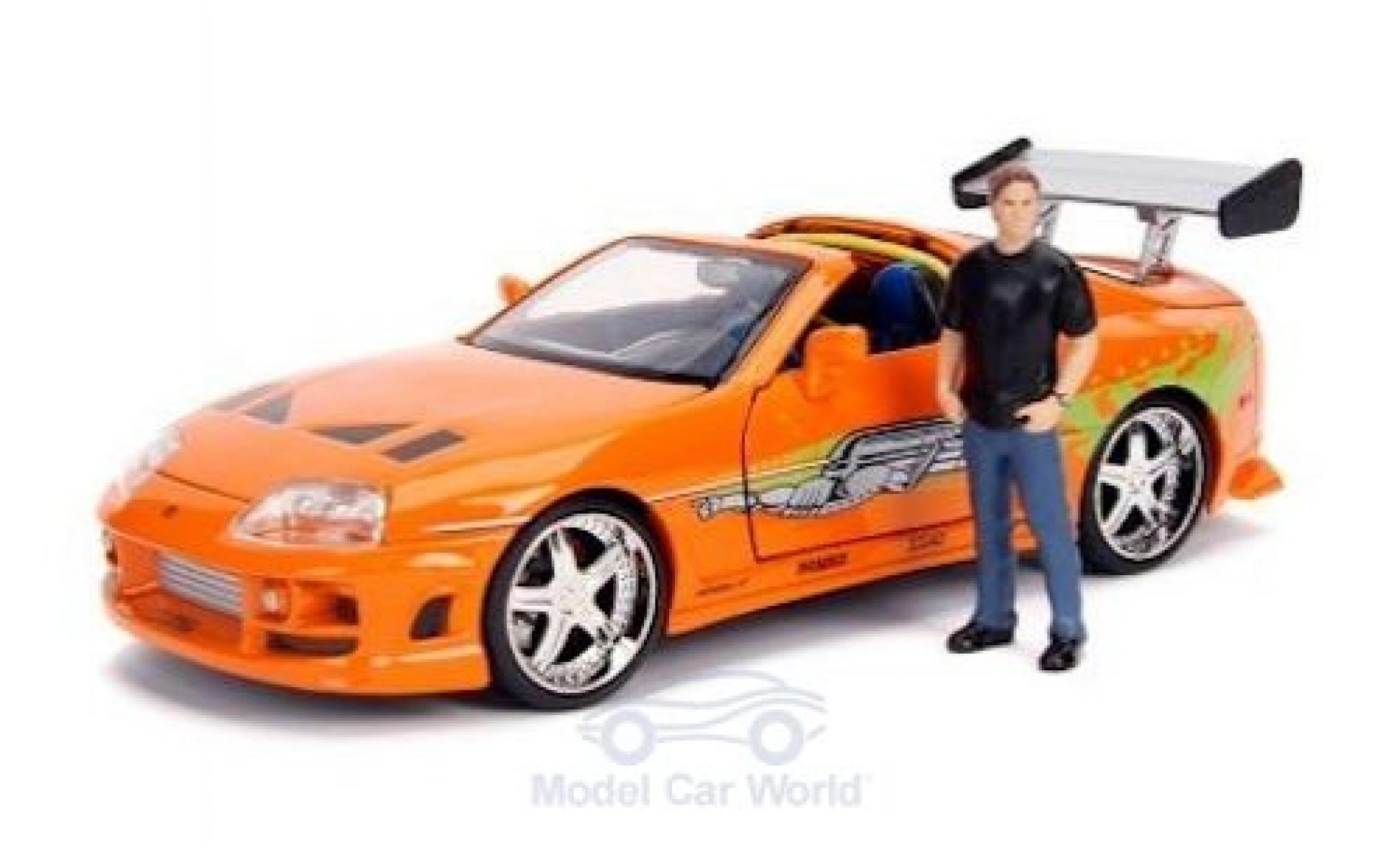 Toyota Supra 1/24 Jada Toys orange/Dekor Fast & Furious 1995 mit Figur modellino in miniatura
