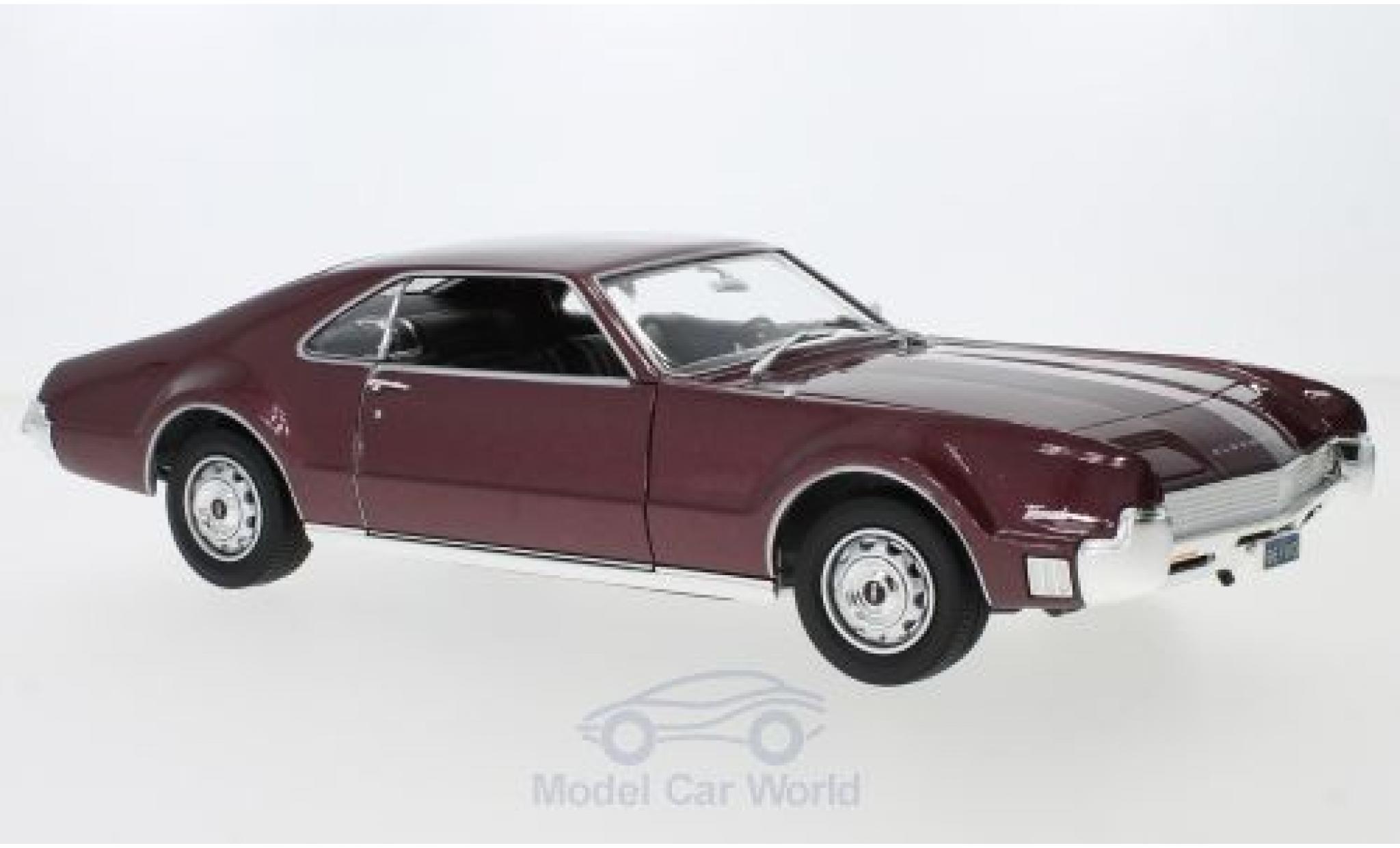 Oldsmobile Toronado 1/18 Lucky Die Cast metallico rosso 1966 ohne Vitrine modellino in miniatura