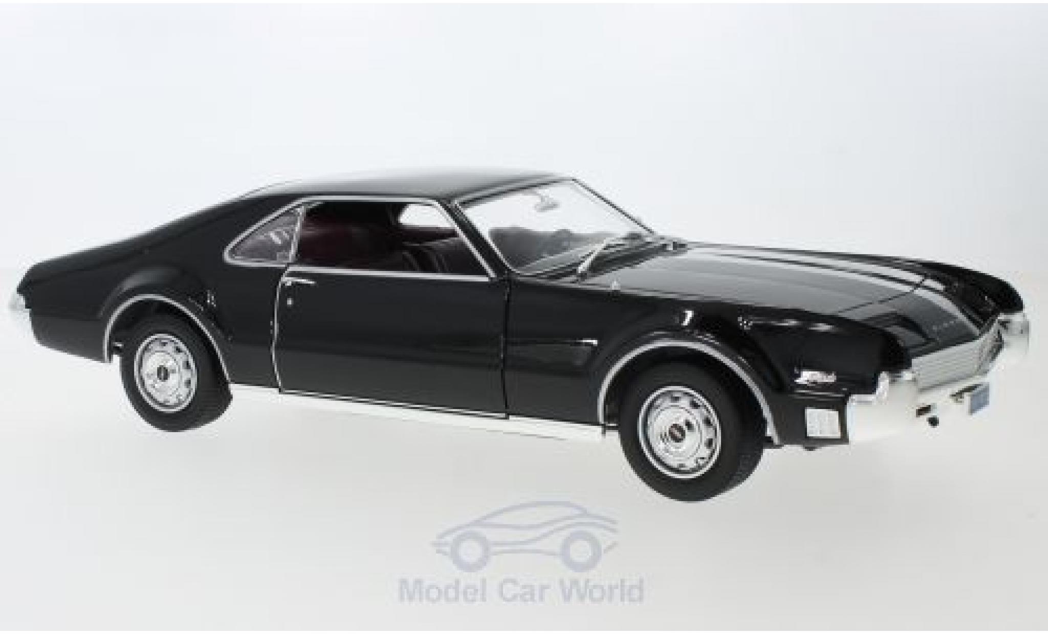 Oldsmobile Toronado 1/18 Lucky Die Cast nero 1966 ohne Vitrine modellino in miniatura