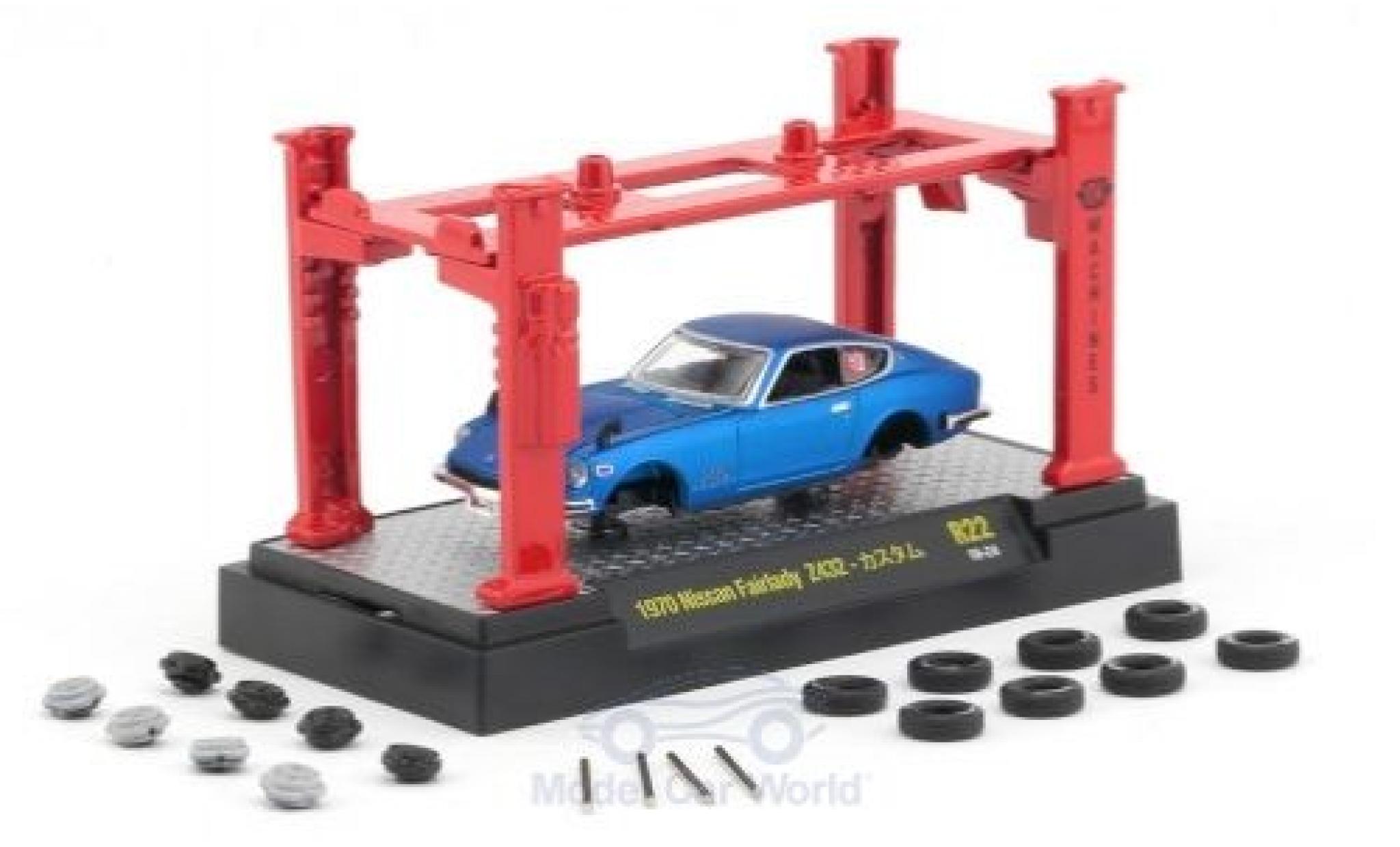 Nissan Fairlady Z Z432 1/64 M2 Machines 432 metallico blu 1970 Model-Kit Bausatz inklusive 4 Ersatzrädern modellino in miniatura
