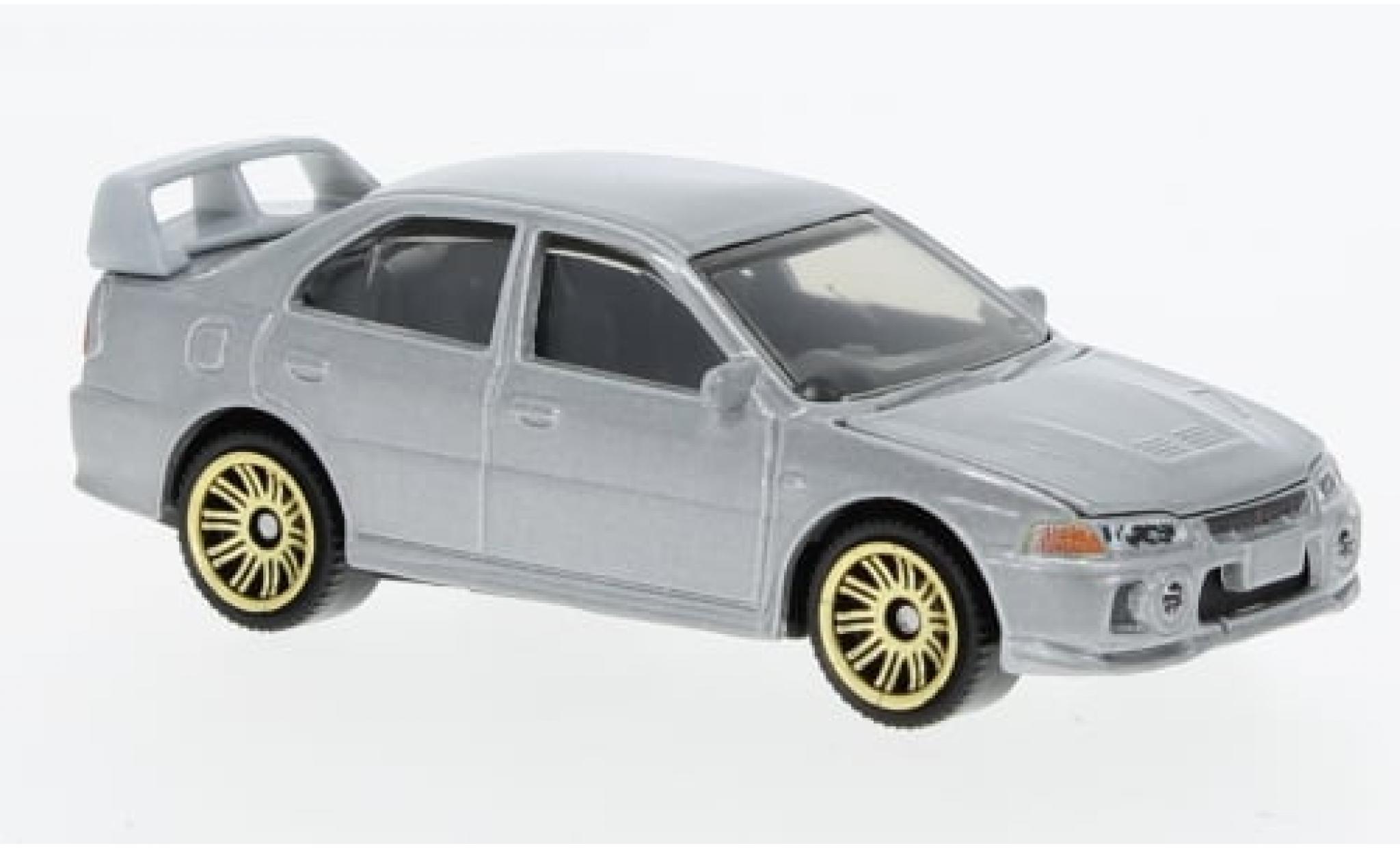 Mitsubishi Lancer 1/64 Matchbox Evolution IV metallise grau 1994 1:64 modellino in miniatura