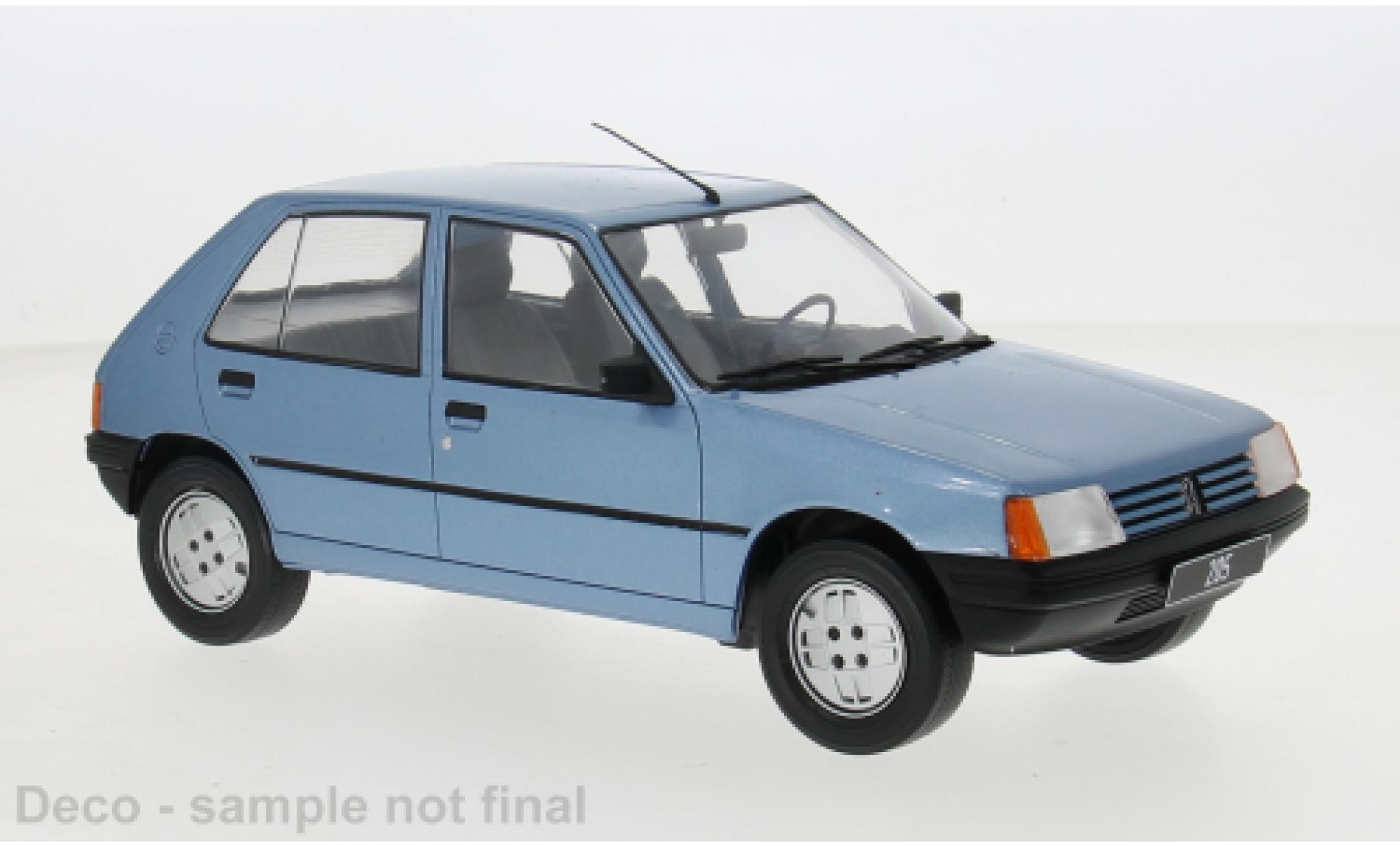 Peugeot 205 1/18 MCG metallise blau 1984 1:18 modellino in miniatura