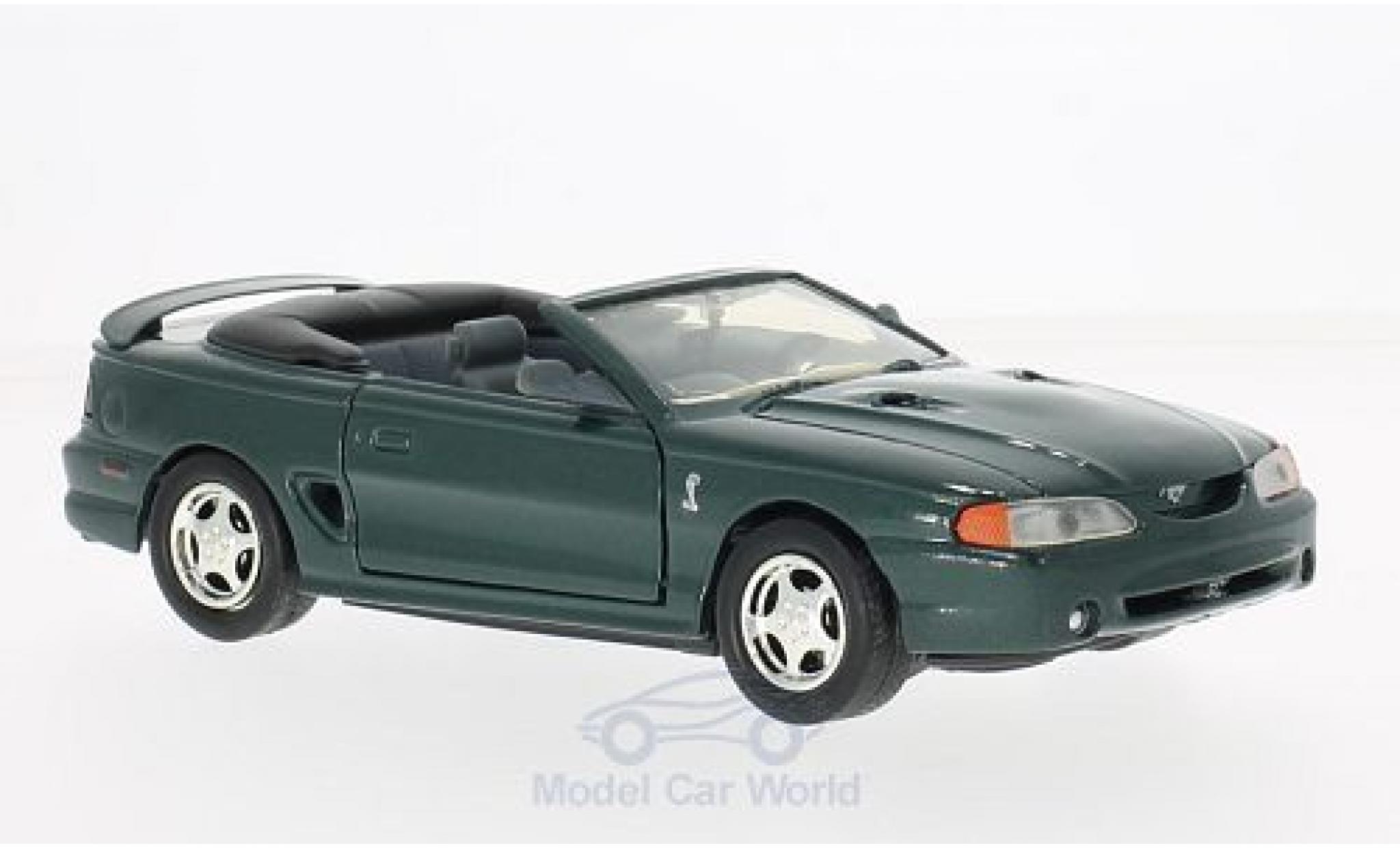 Ford Mustang 1/24 Motormax SVT Cobra Convertibile metallico verde 1998 modellino in miniatura
