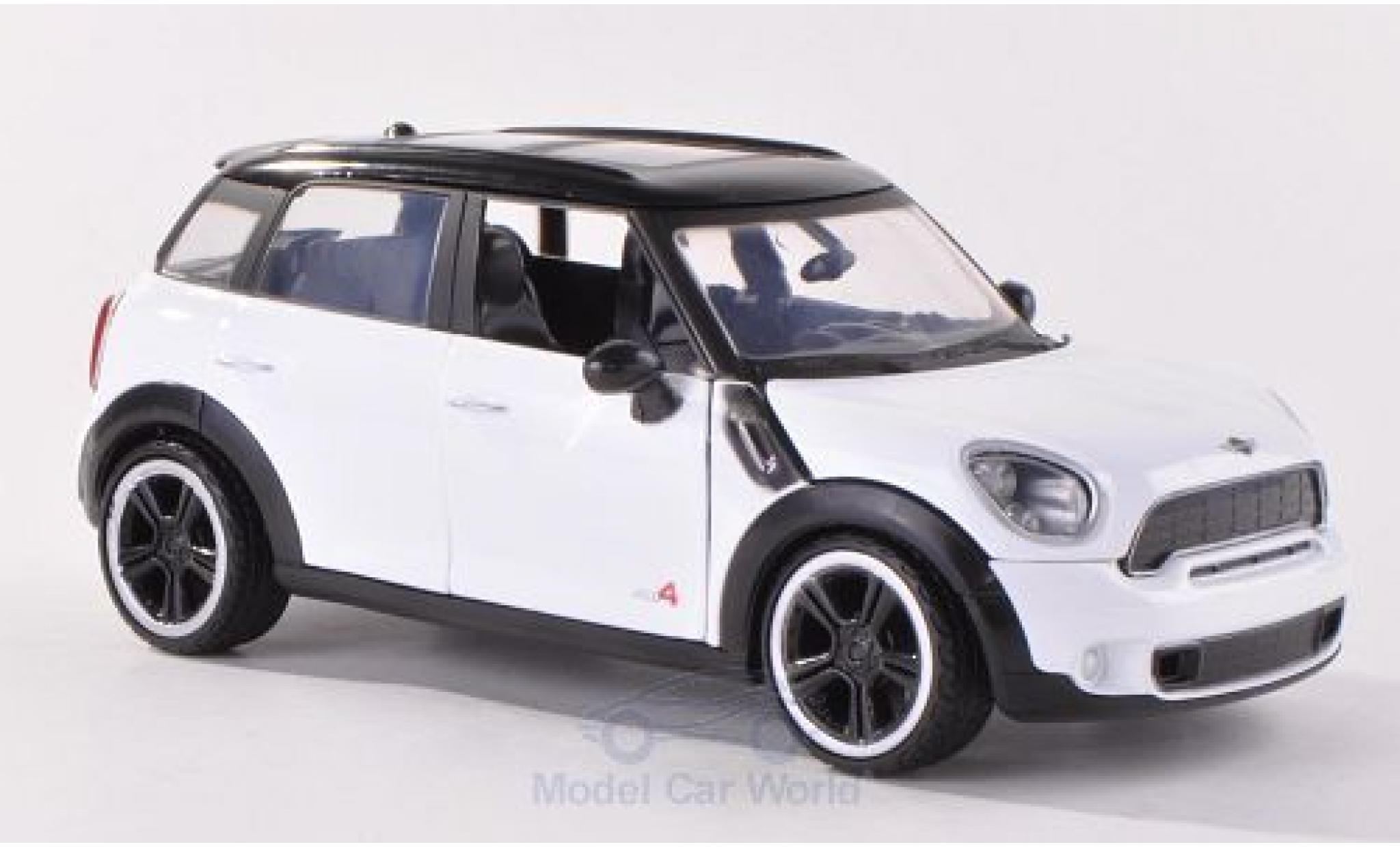 Mini Cooper 1/24 Motormax S Countryman bianco/nero modellino in miniatura