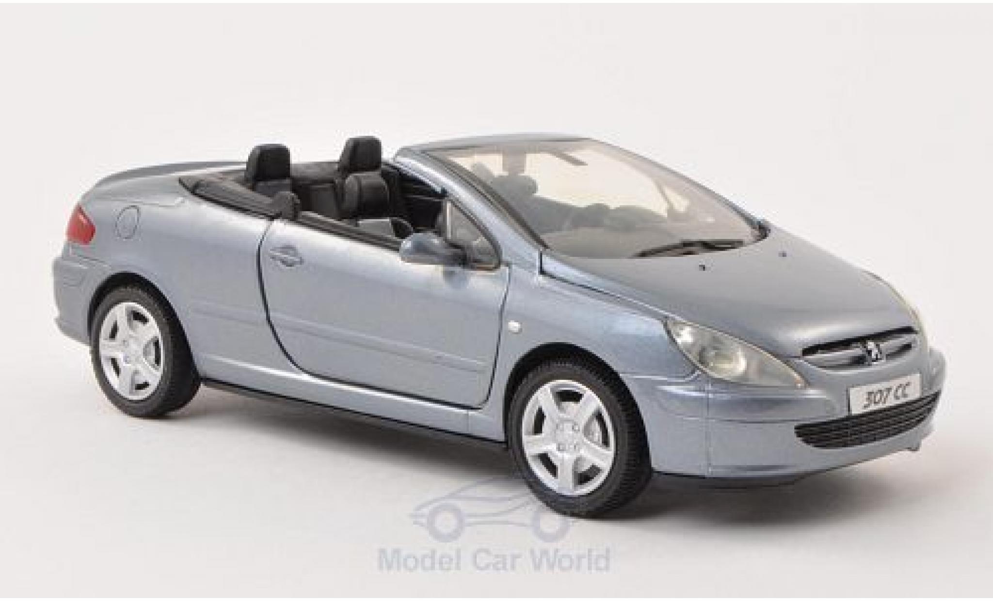 Peugeot 307 1/24 Motormax CC metallico blu ohne Vitrine modellino in miniatura