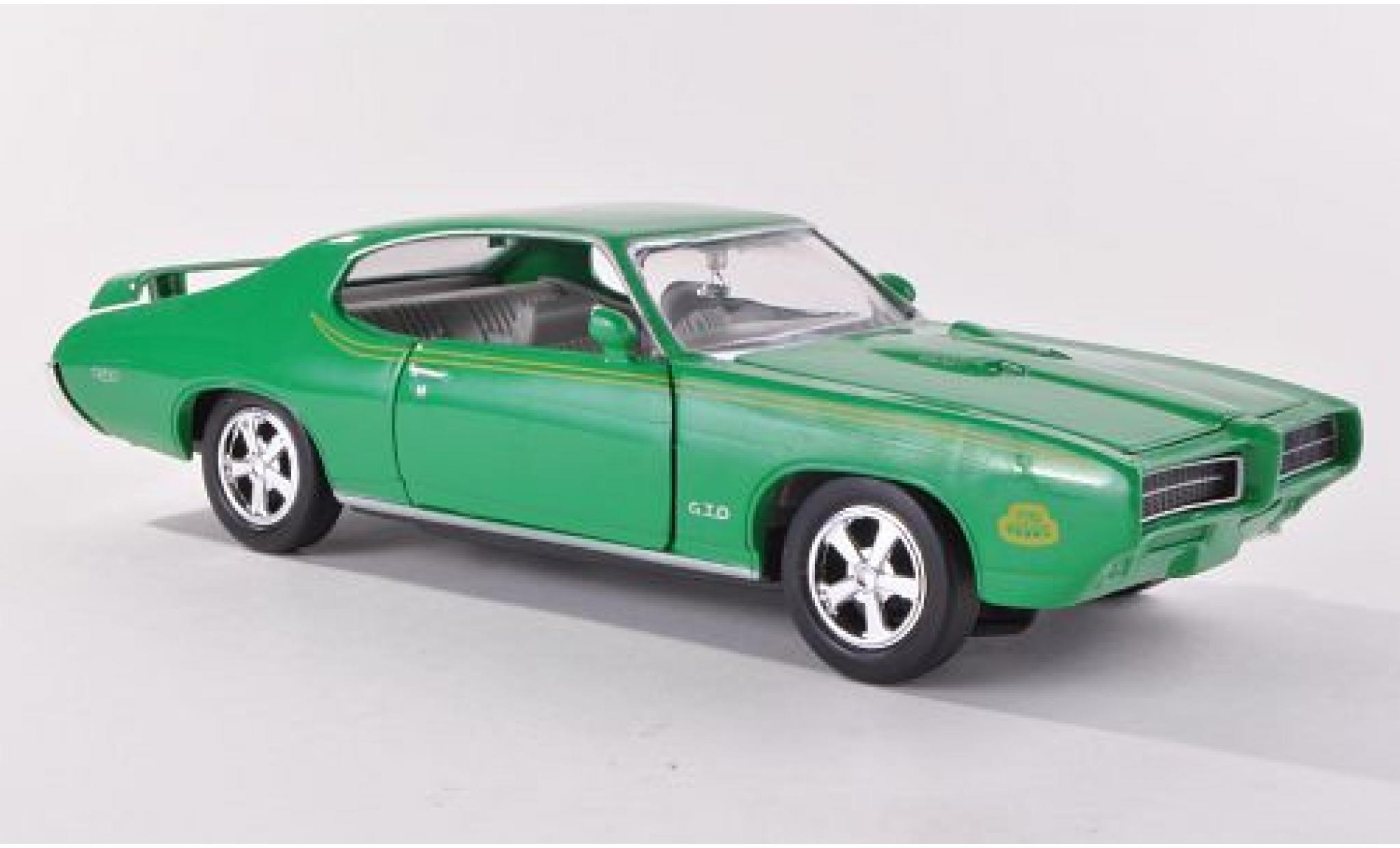 Pontiac GTO 1/24 Motormax Judge gr&uuml;n 1969 1:24 modellino in miniatura