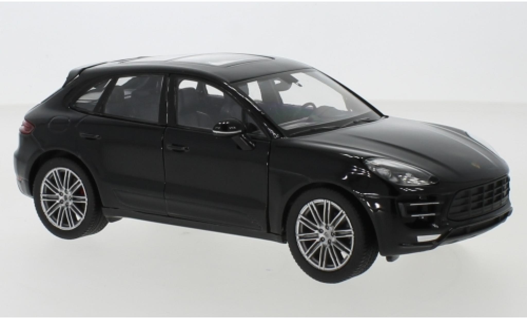 Porsche Macan Turbo 1/24 Welly schwarz 1:24 modellino in miniatura