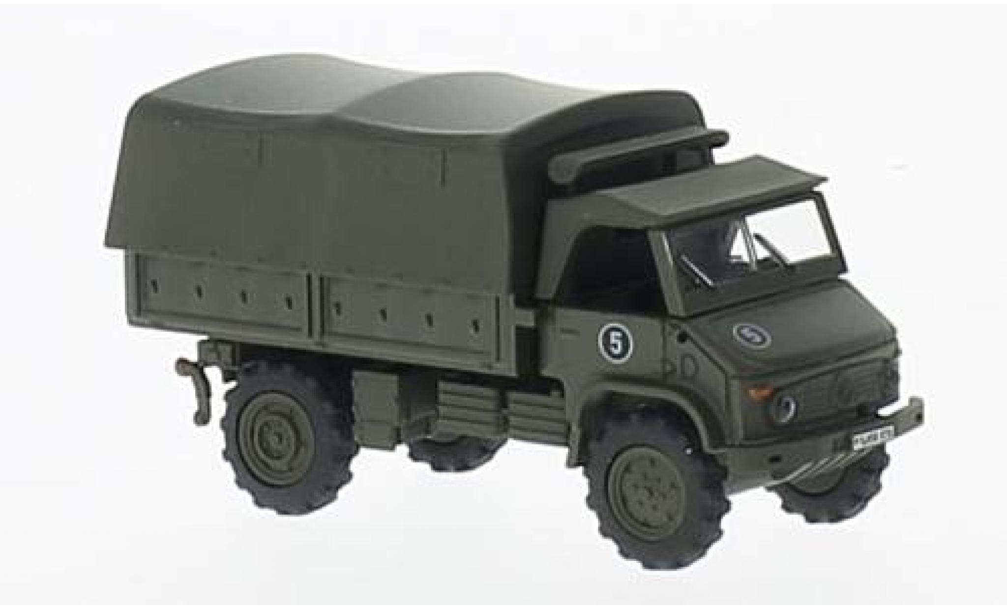 Mercedes Unimog 1/87 Schuco S404 oliv Bundeswehr plateforme-toile modellino in miniatura