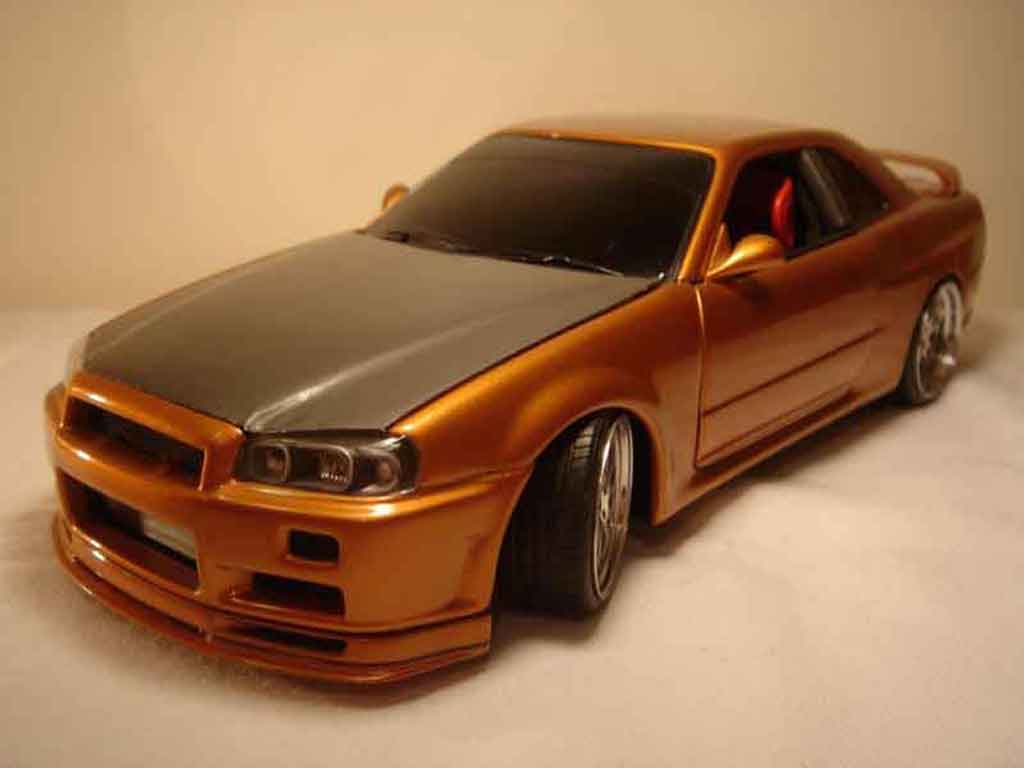 Nissan Skyline R34 1/18 Autoart R34 orange carbon kit nos tuning modellino in miniatura