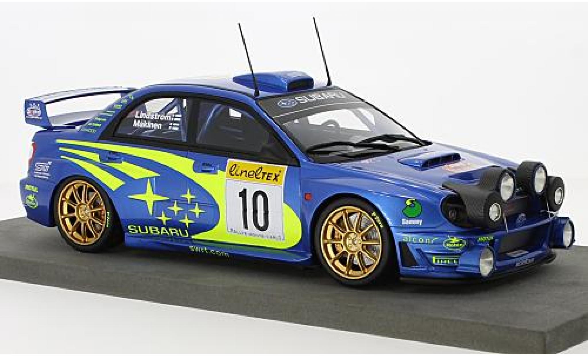 Subaru Impreza 1/18 Topmarques Collectibles S7 No.10 Rallye WM Rallye Monte Carlo 2002 avec Zusatzscheinwerfer T.Mäkinen/K.Lindström modellino in miniatura