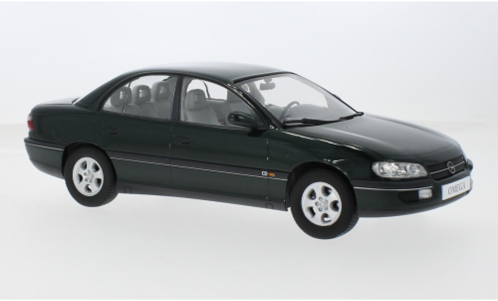 Opel Omega 1/18 Triple 9 Collection B metallise grün 1996 1:18 modellino in miniatura