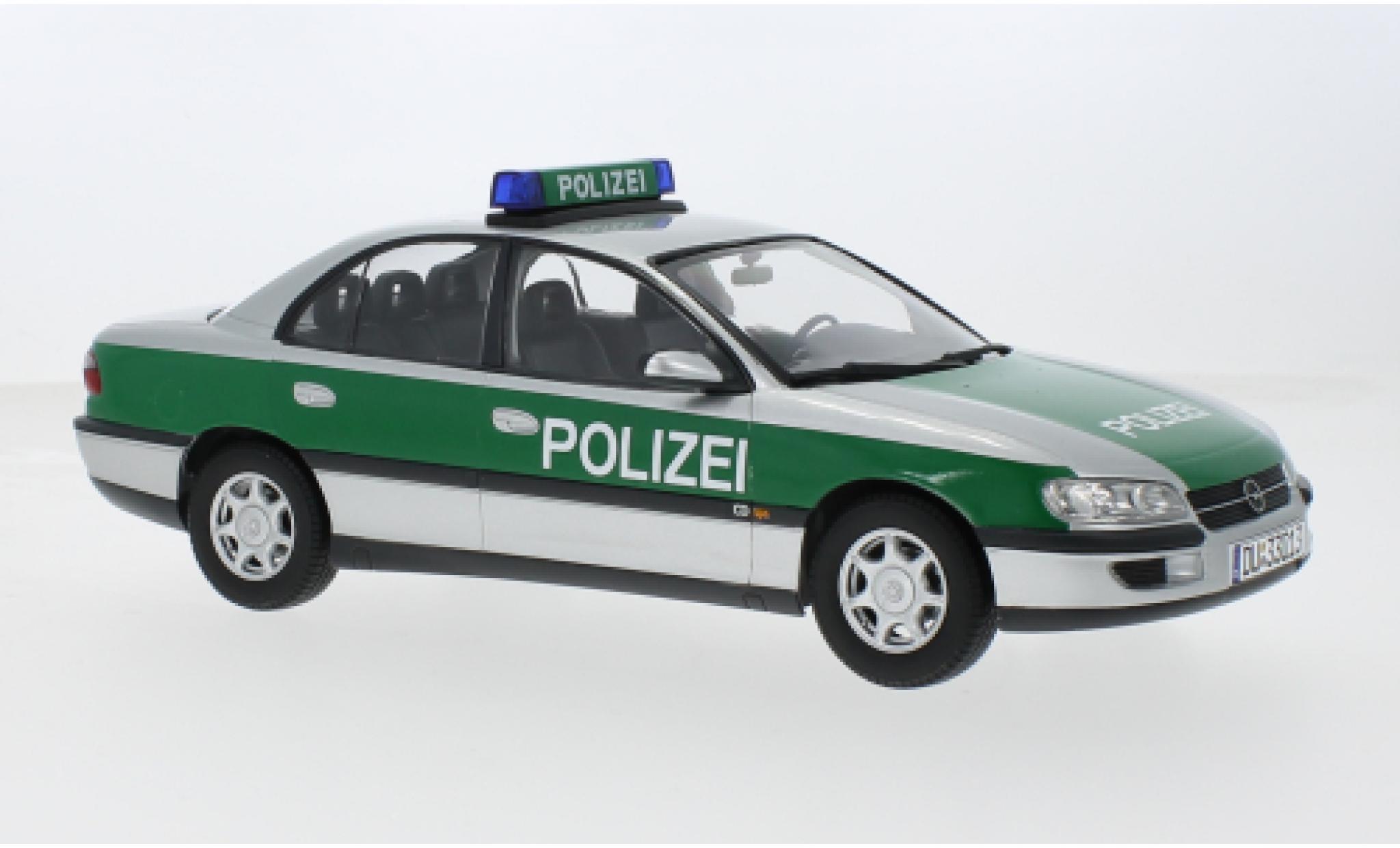 Opel Omega 1/18 Triple 9 Collection B Polizei (D) 1996 1:18 modellino in miniatura
