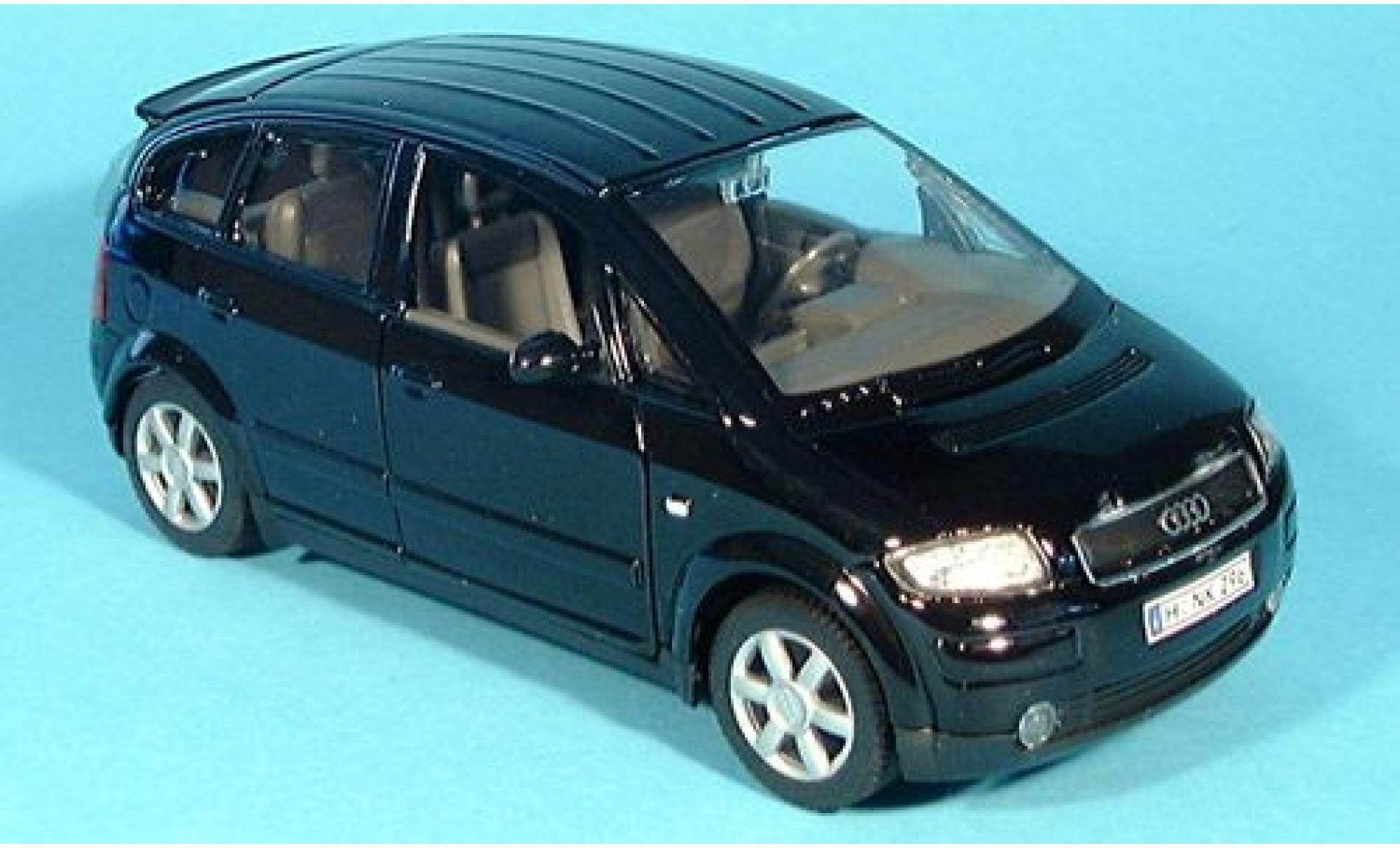 Audi A2 1/24 Welly schwarz 1:24 modellino in miniatura