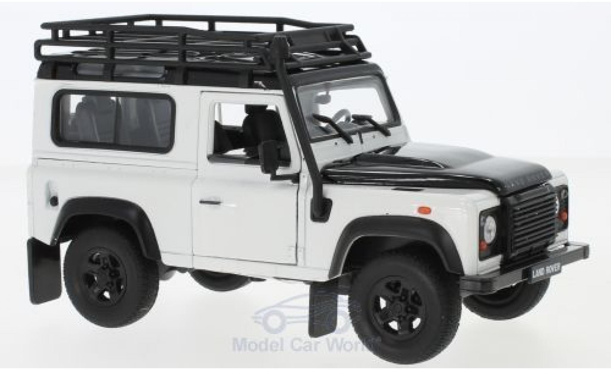 Land Rover Defender 1/24 Welly bianco/nero mit Dachgepäckträger modellino in miniatura