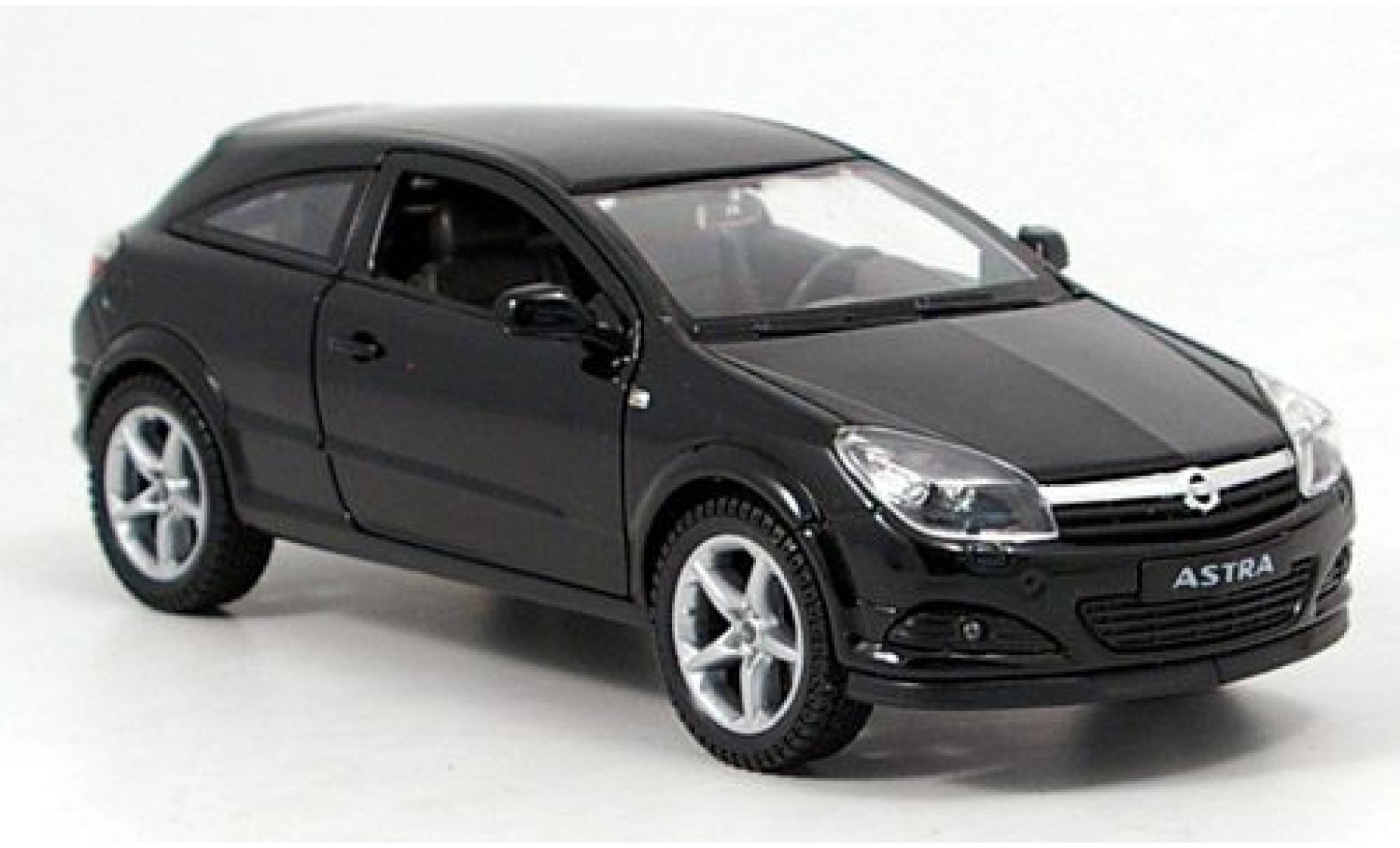 Opel Astra 1/24 Welly GTC schwarz 1:24 modellino in miniatura