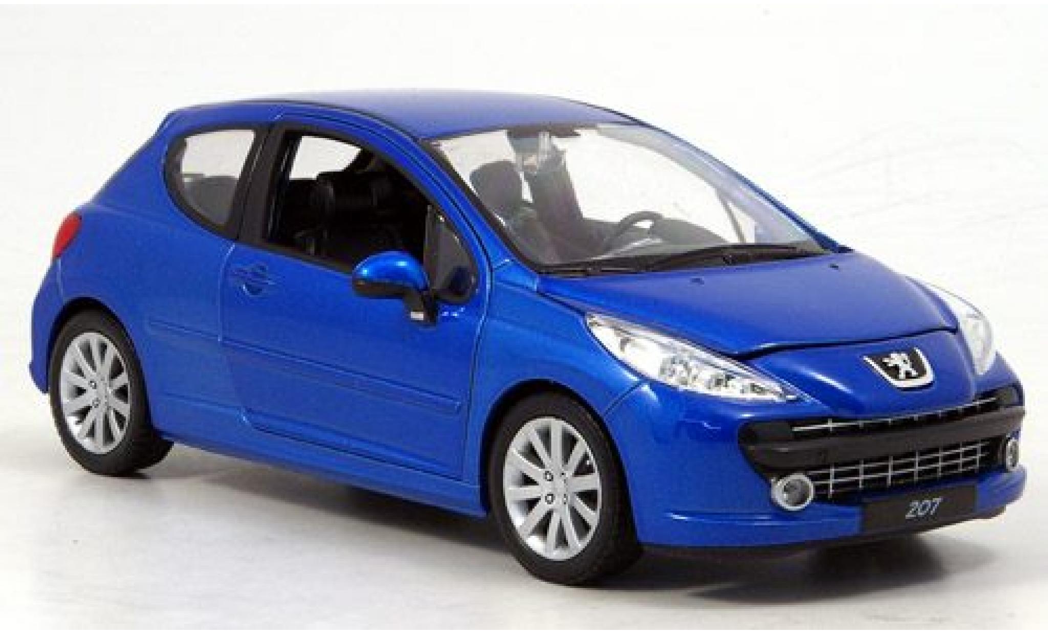Peugeot 207 1/24 Welly blau 1:24 modellino in miniatura