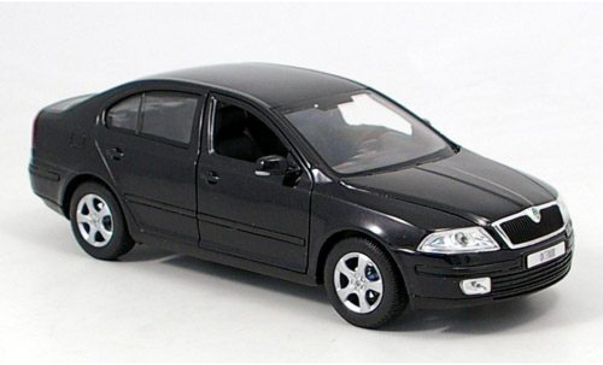 Skoda Octavia 1/24 Welly schwarz 1:24 modellino in miniatura