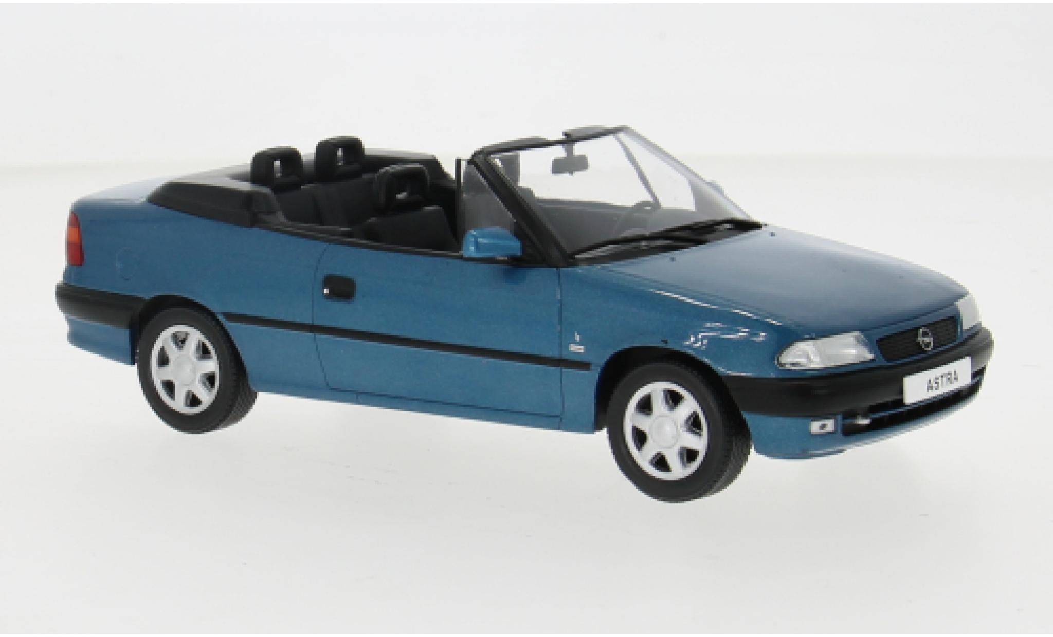 Opel Astra 1/24 WhiteBox F Cabrio metallise türkis 1994 1:24 modellino in miniatura