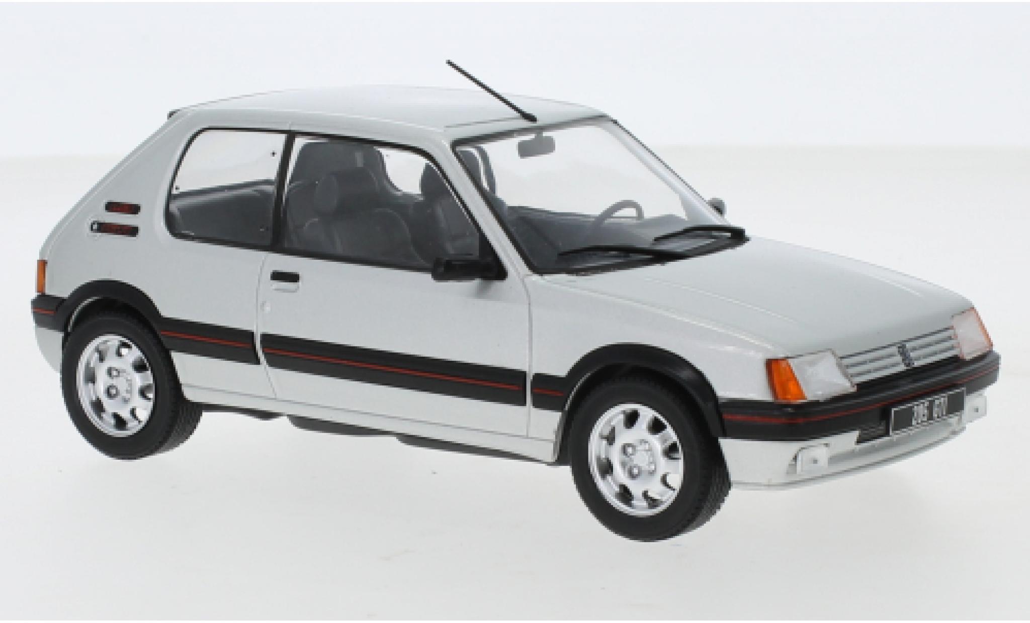 Peugeot 205 1/24 WhiteBox 1.9 GTI grigio 1988 modellino in miniatura