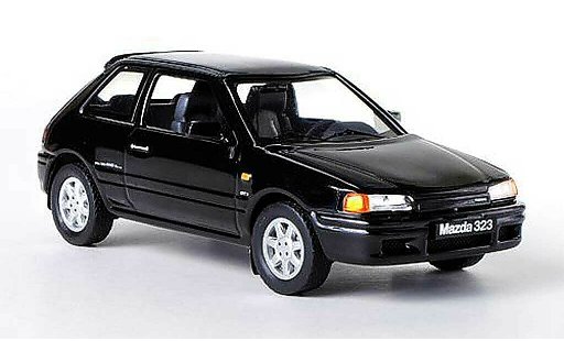 Mazda 323 GTX 1/43 IXO nero LHD 1989 modellini auto