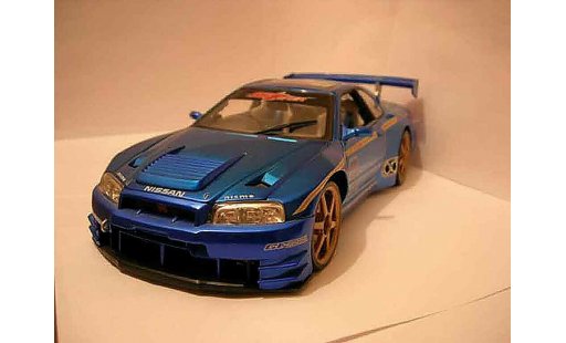 Nissan Skyline R34 GTR 1/18 Muscle Machines kit large modellini auto