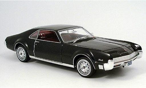 Oldsmobile Toronado 1/18 Motormax nero 1966 modellino in miniatura
