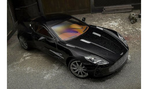 Aston Martin One-77 coupe 1/18 Autoart 77 nero pearl interieur orange modellini auto