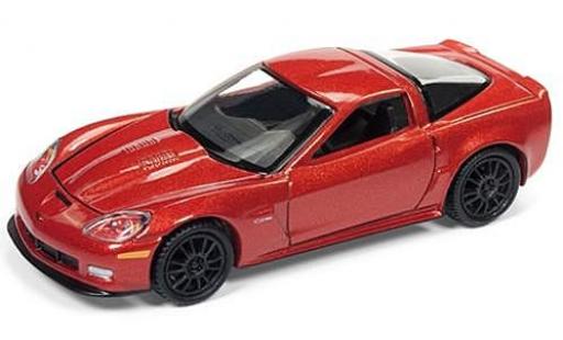 Chevrolet Corvette 1/64 Auto World metallico orange 2011 sans Vitrine modellino in miniatura