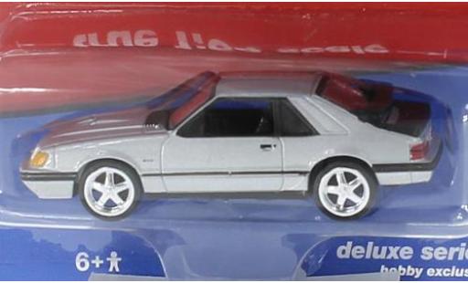 Ford Mustang 1/64 Auto World SVO grigio 1984 modellino in miniatura