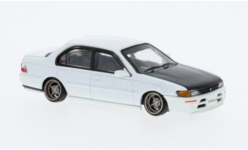 Toyota Corolla 1/64 BM Creations (AE100) bianco 1996 modellino in miniatura