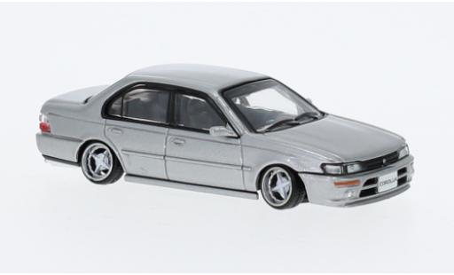 Toyota Corolla 1/64 BM Creations (AE100) metallise grigio 1996 modellino in miniatura